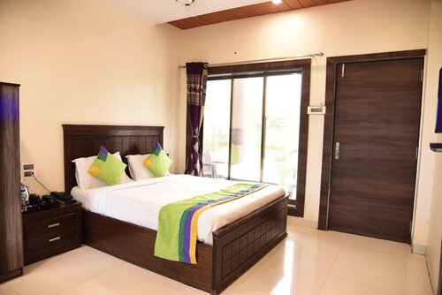 Treebo Trend Garden Cottage & Lawn