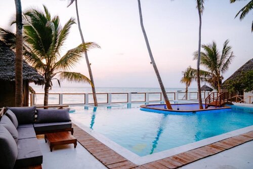 Tiki Beach Club And Resort