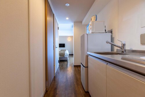 Mr.KINJO in front of Manza Beach