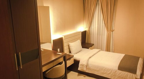 Travellers Suites Serviced Apartments