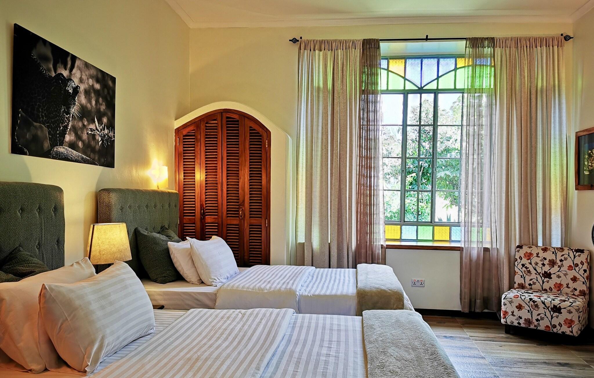 Twin Deluxe Two Queen Beds