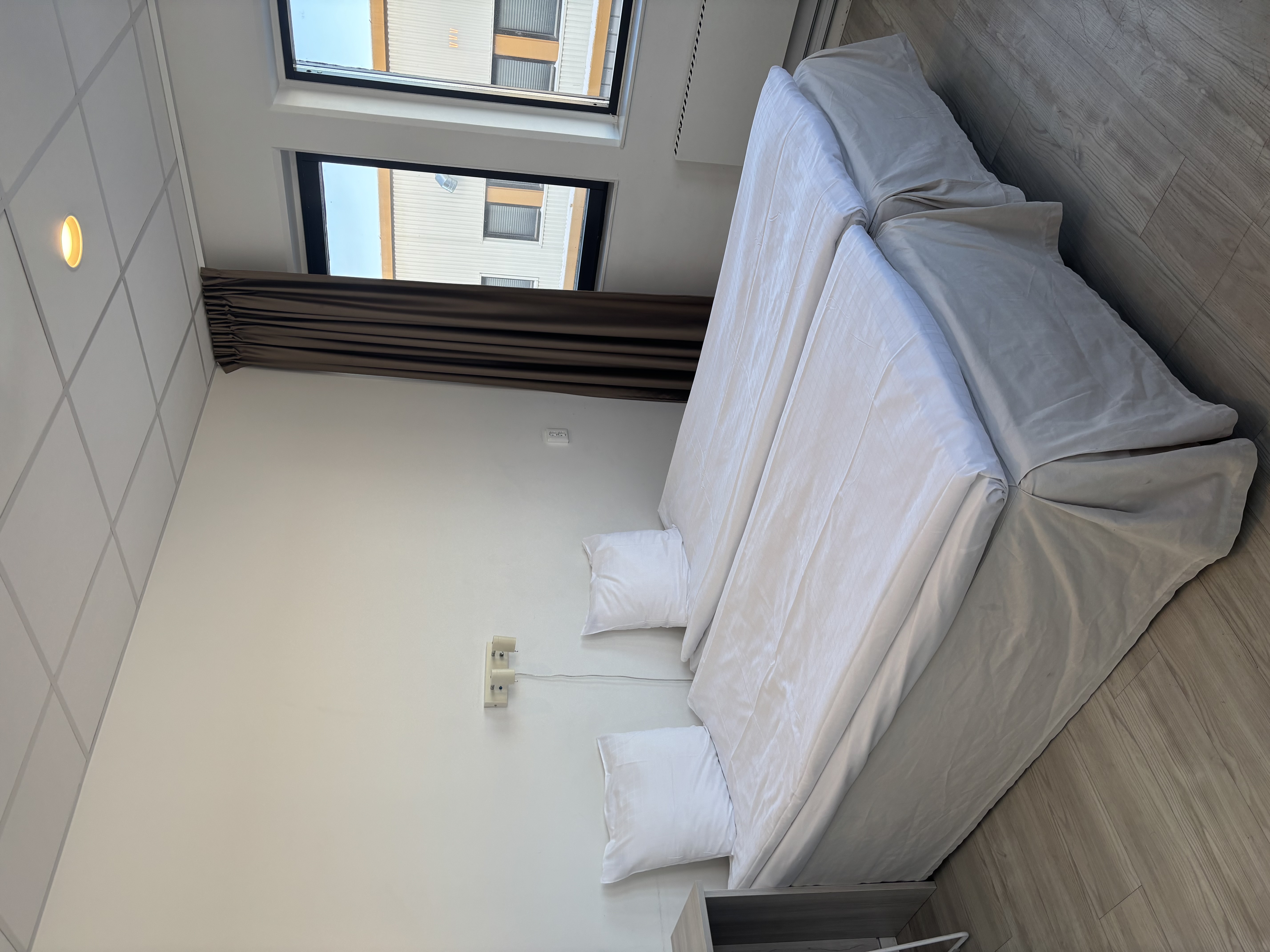 Quadruple Economy with Shared Bathroom