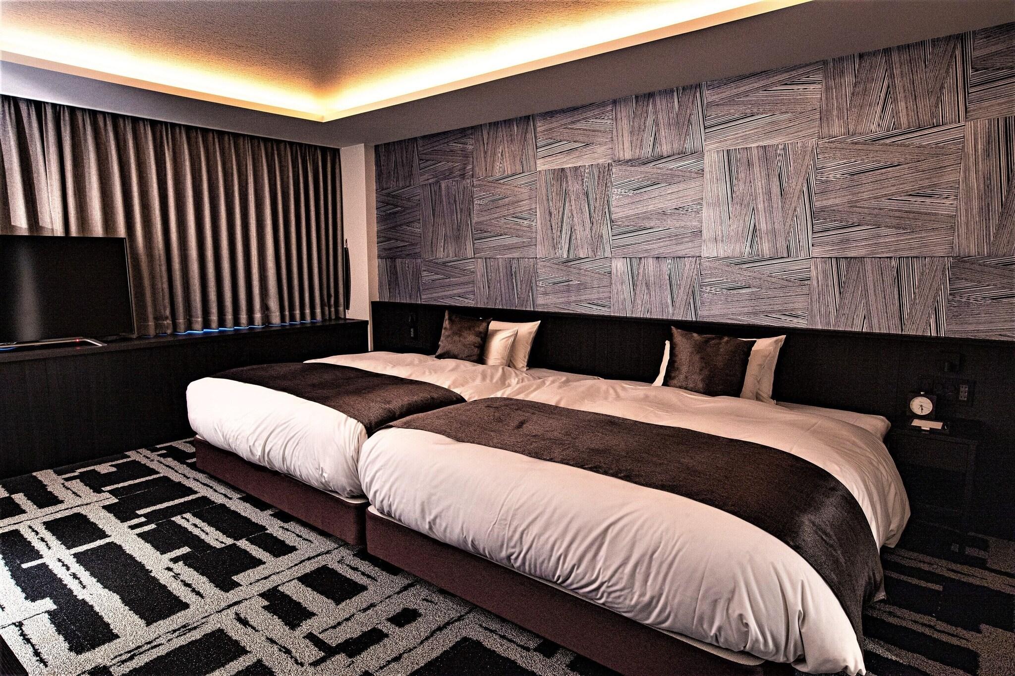 Quadruple Deluxe Two Queen Beds