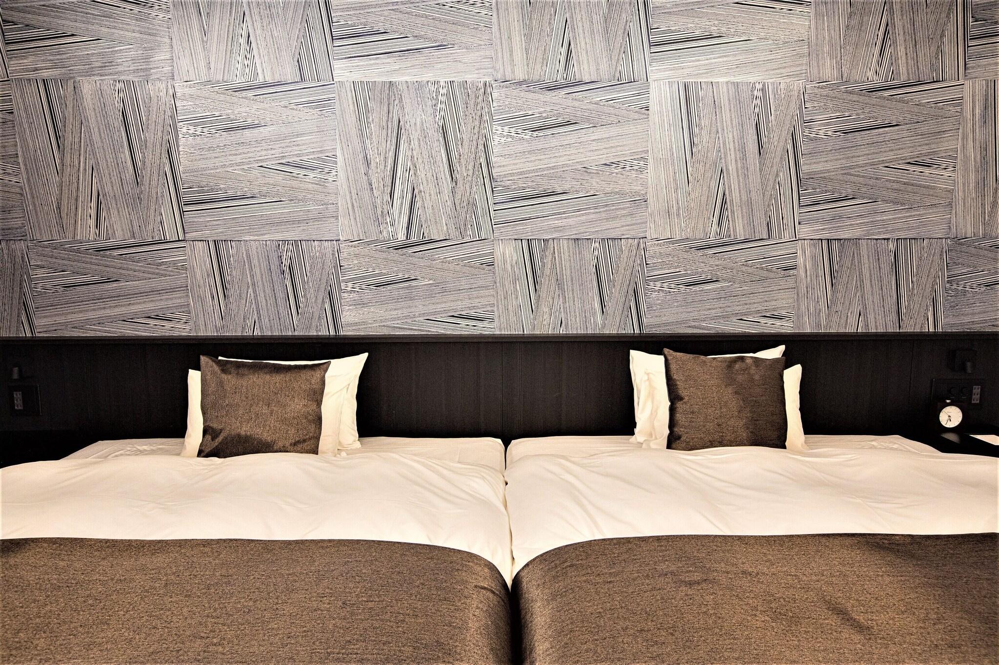 Quadruple Deluxe Two Queen Beds