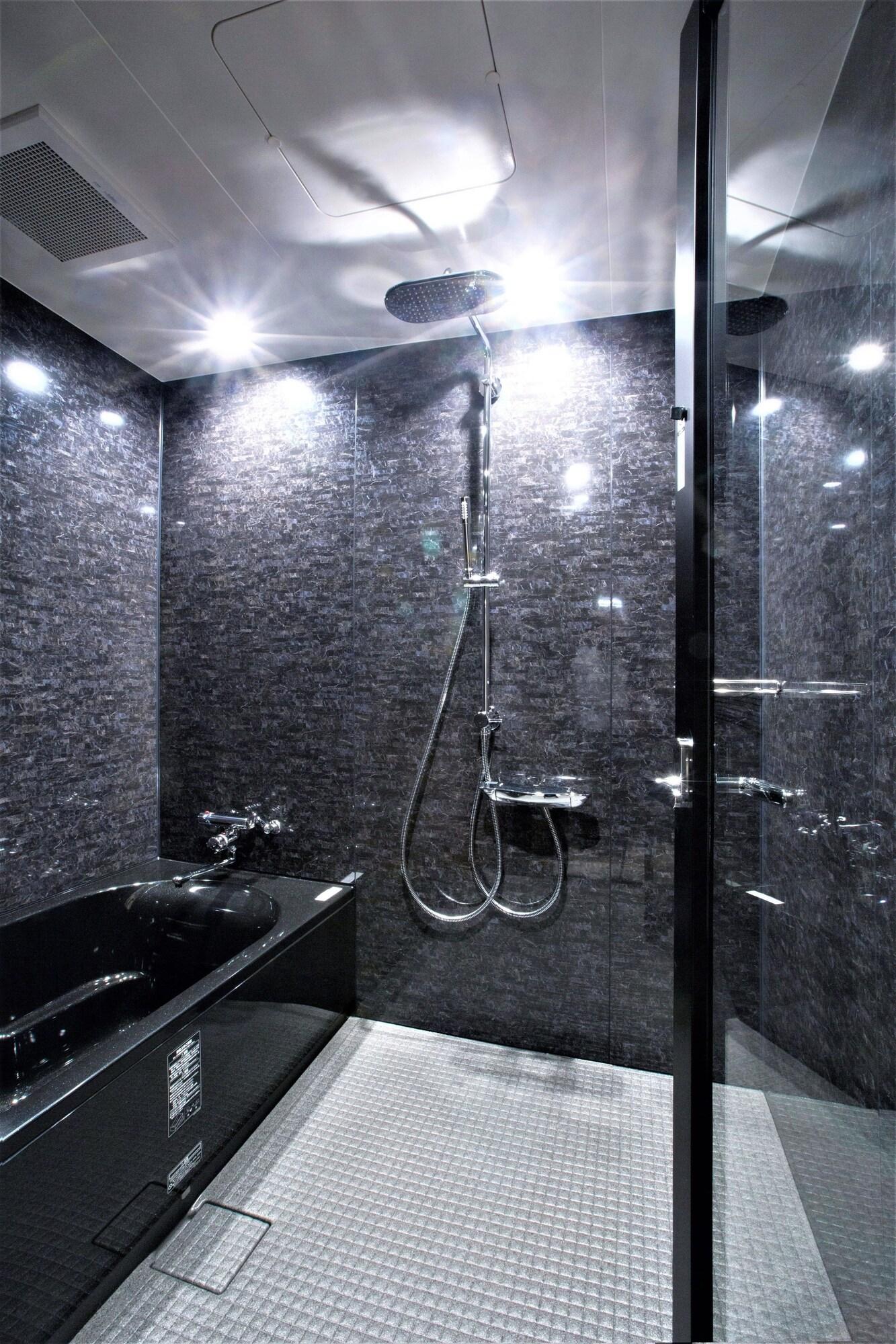 Quadruple Deluxe Two Queen Beds