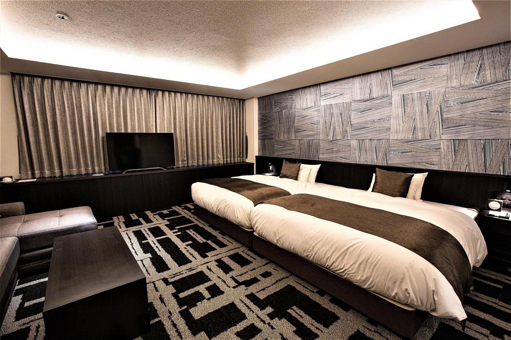 Quadruple Deluxe Two Queen Beds