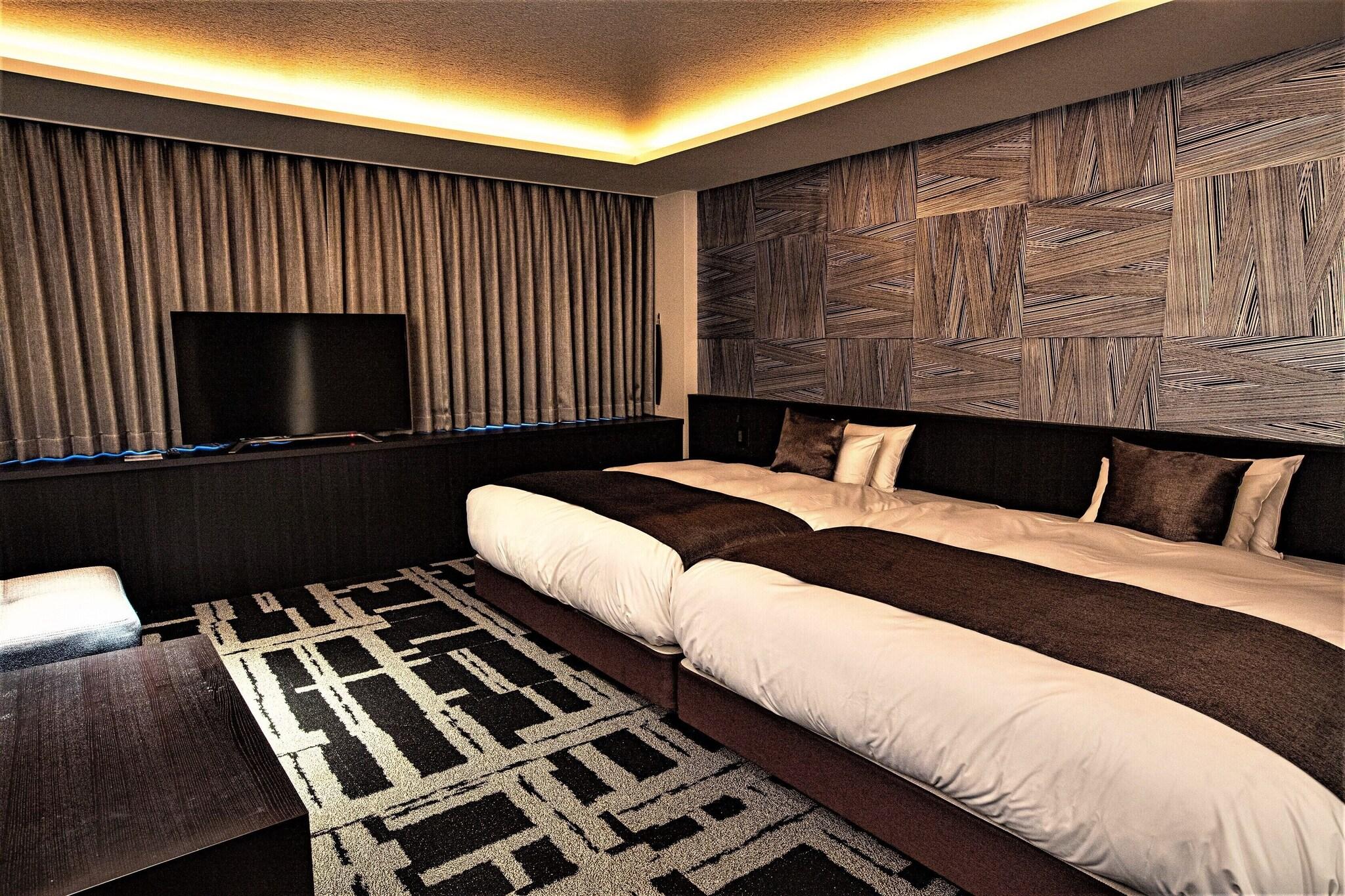 Quadruple Deluxe Two Queen Beds