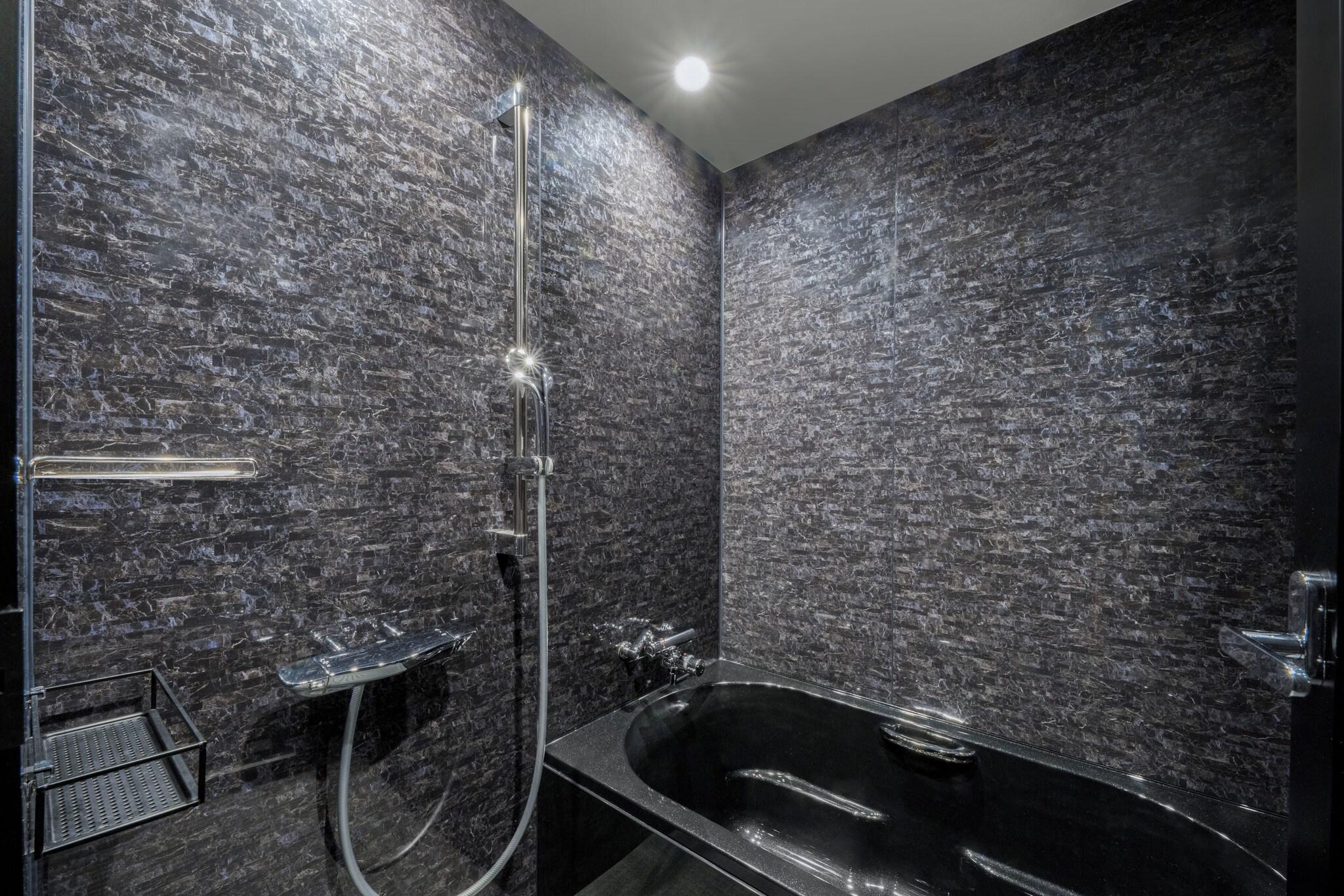 Quadruple Deluxe Two Queen Beds