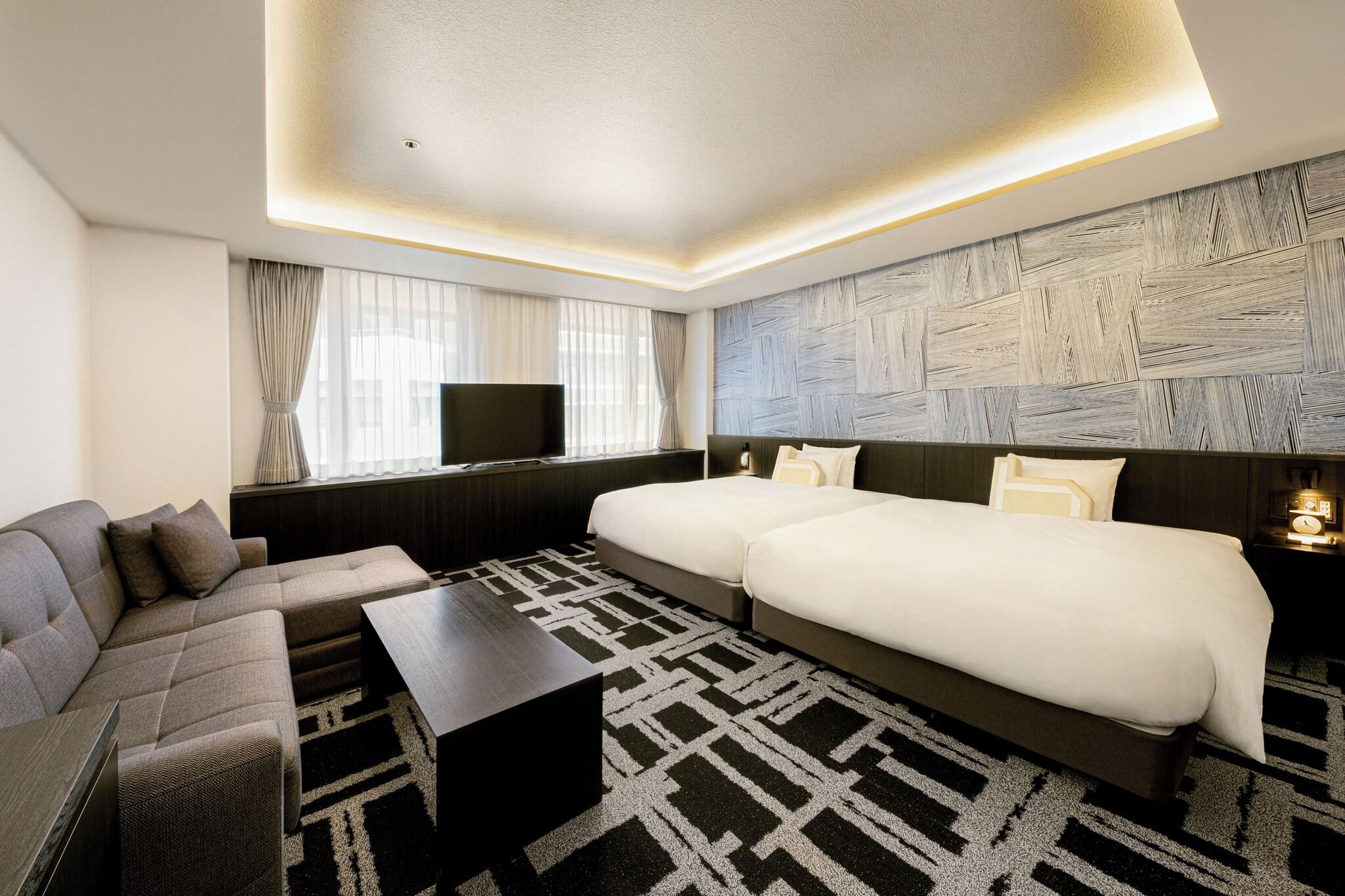 Quadruple Deluxe Two Queen Beds