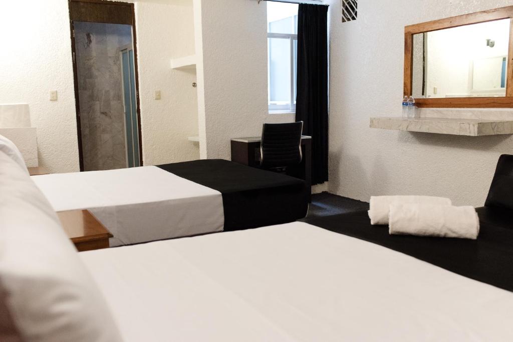 Quadruple Two Queen Beds