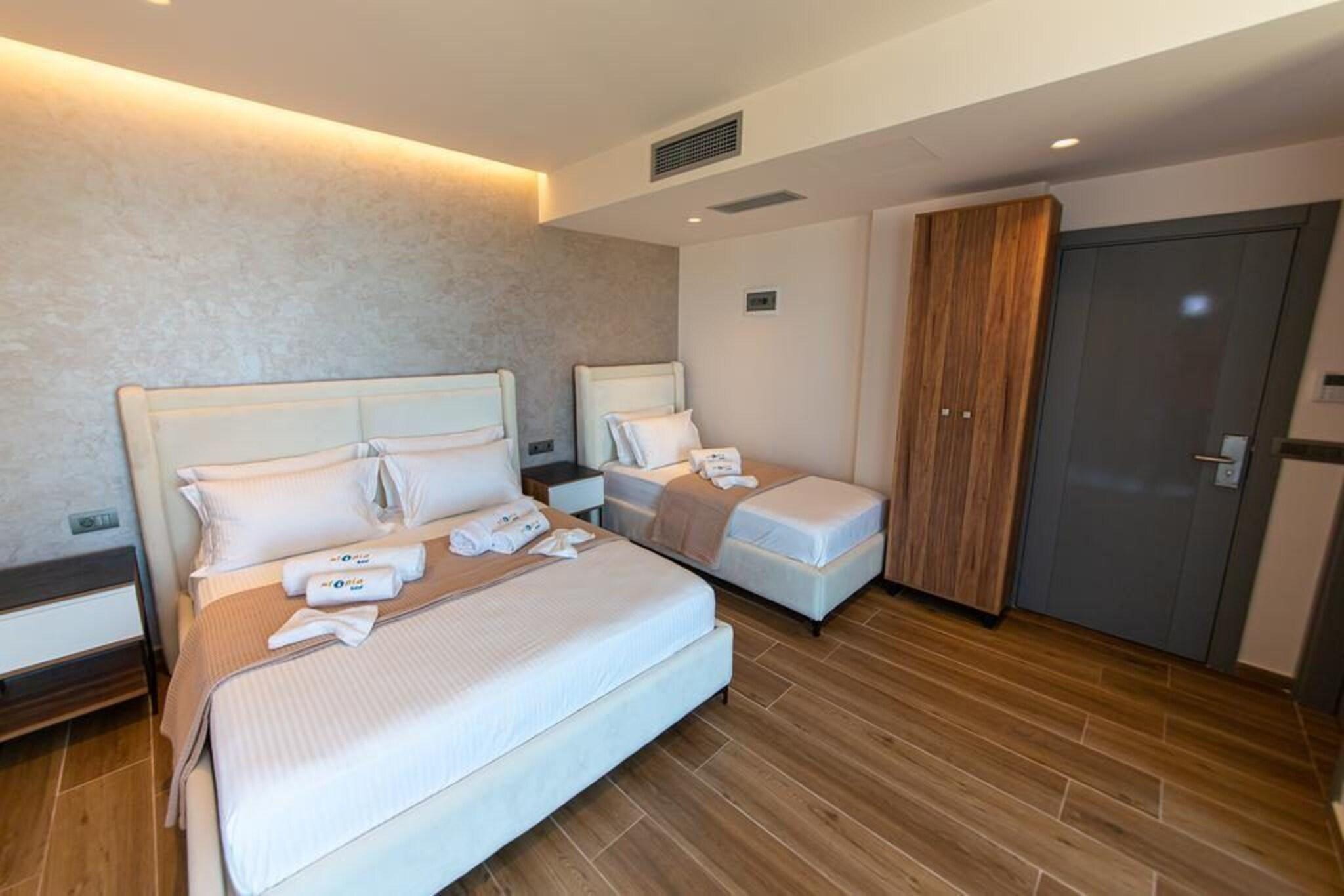 Triple Deluxe Queen Bed