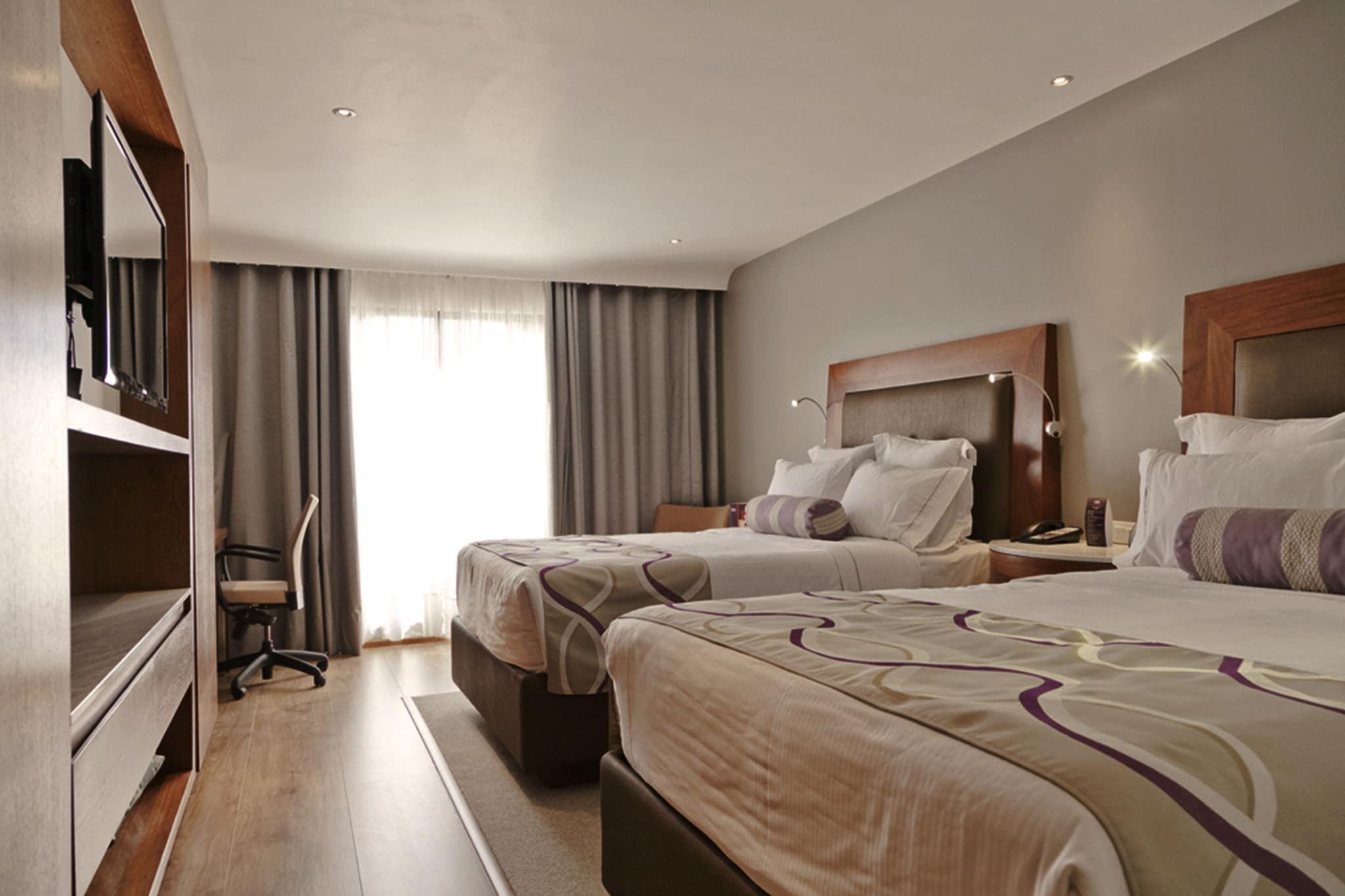 Double Deluxe Two Queen Beds