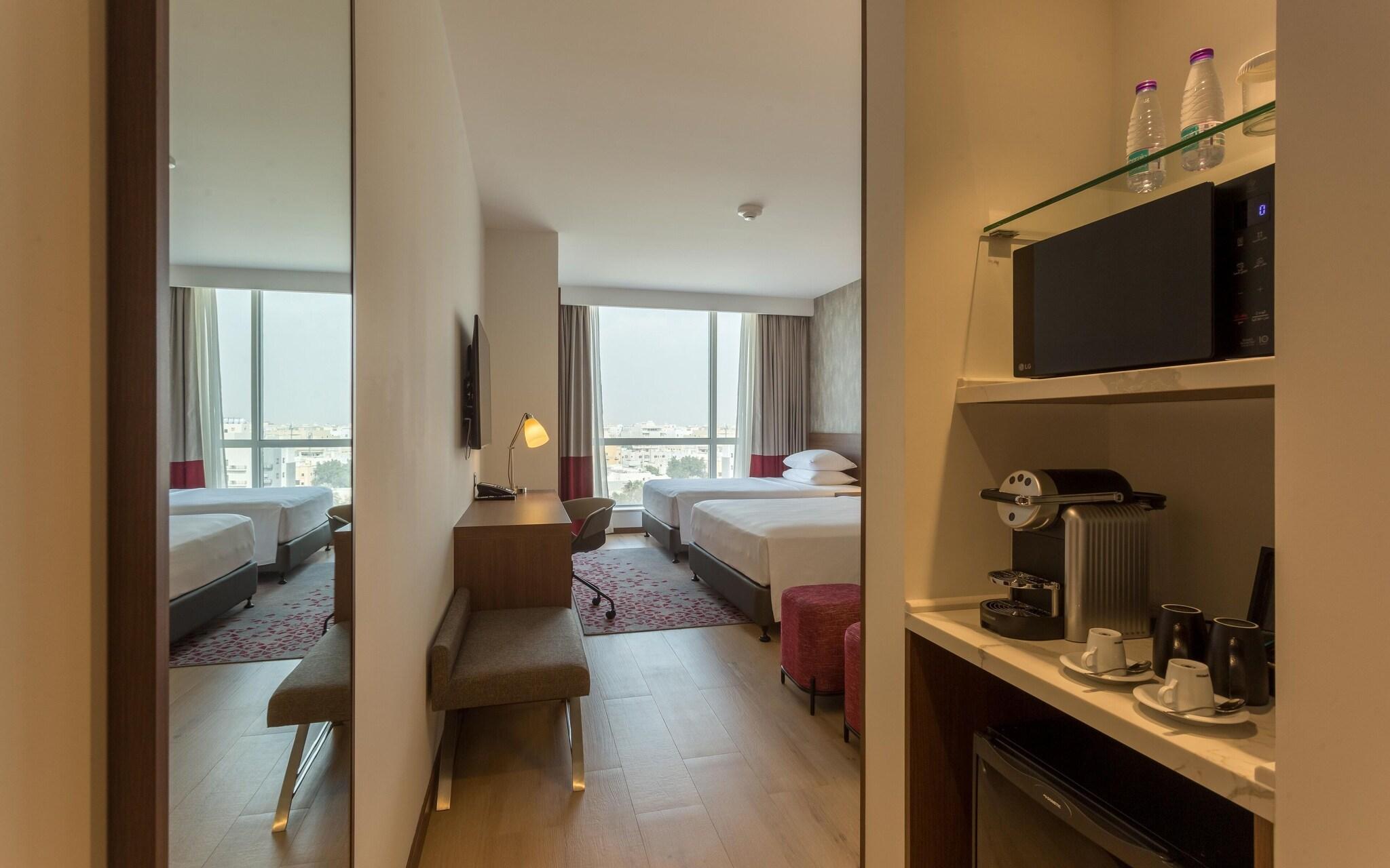 Quadruple Deluxe Queen Bed