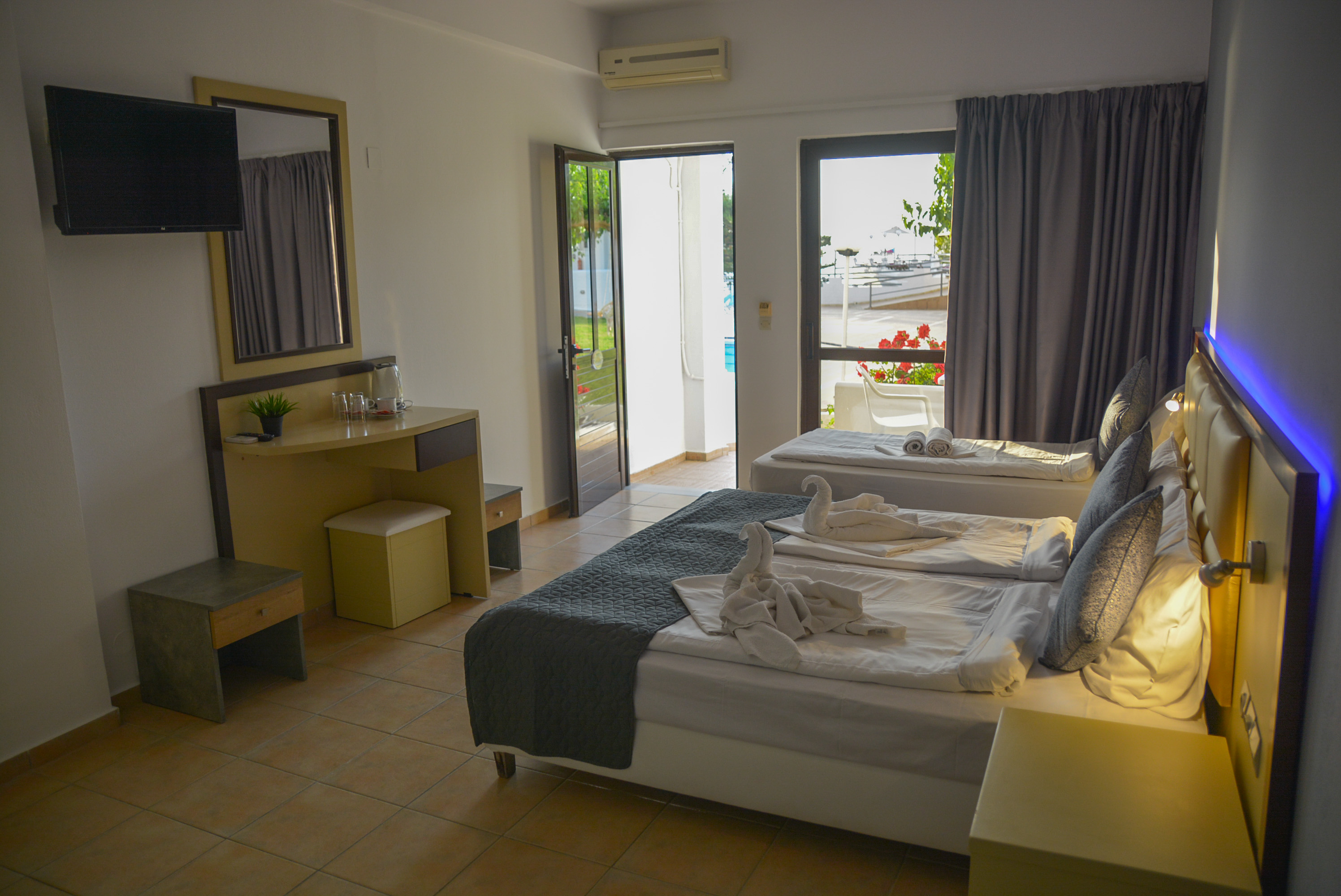 Triple Superior Two Double Beds