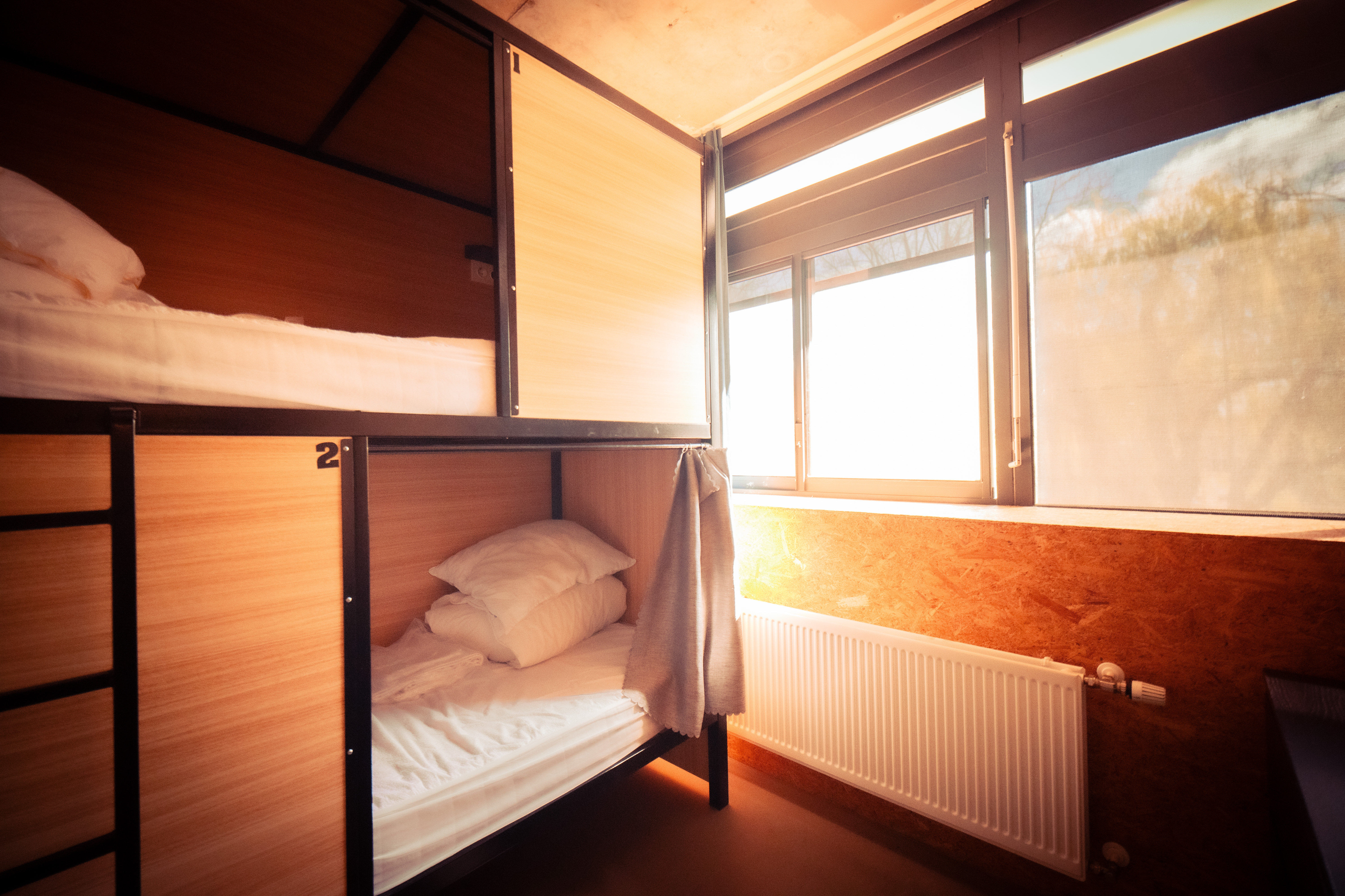 Bed in Dormitory Female Room with Shared Bathroom