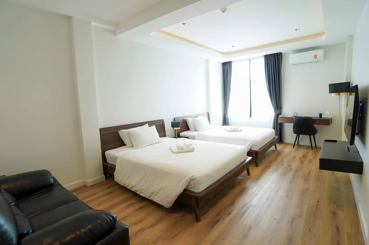 Twin Deluxe Queen Bed