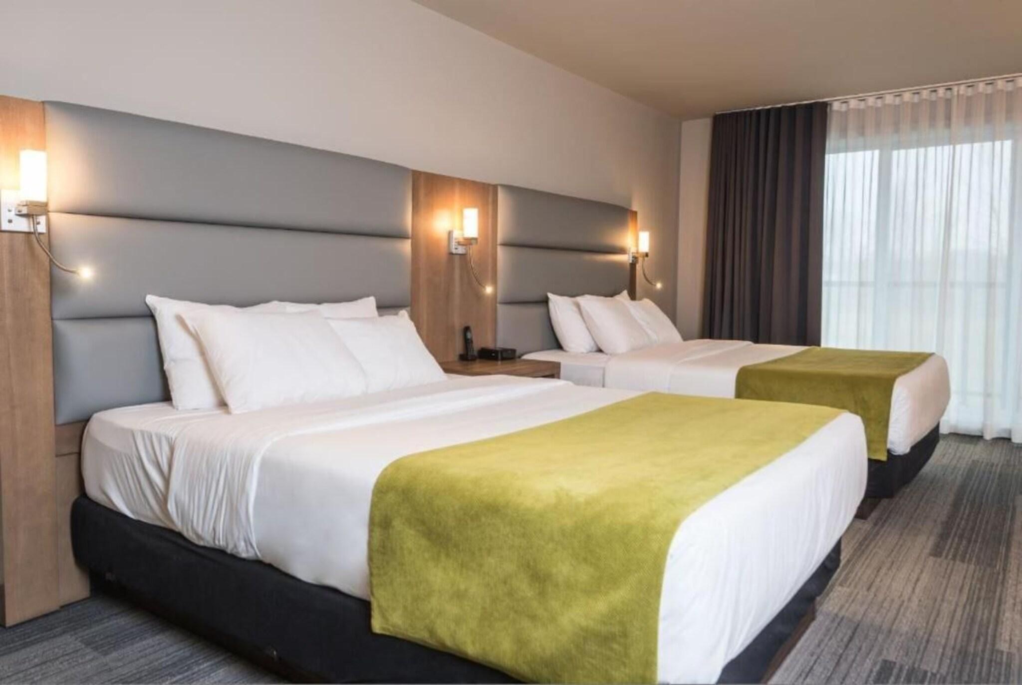 Quadruple Two Queen Beds