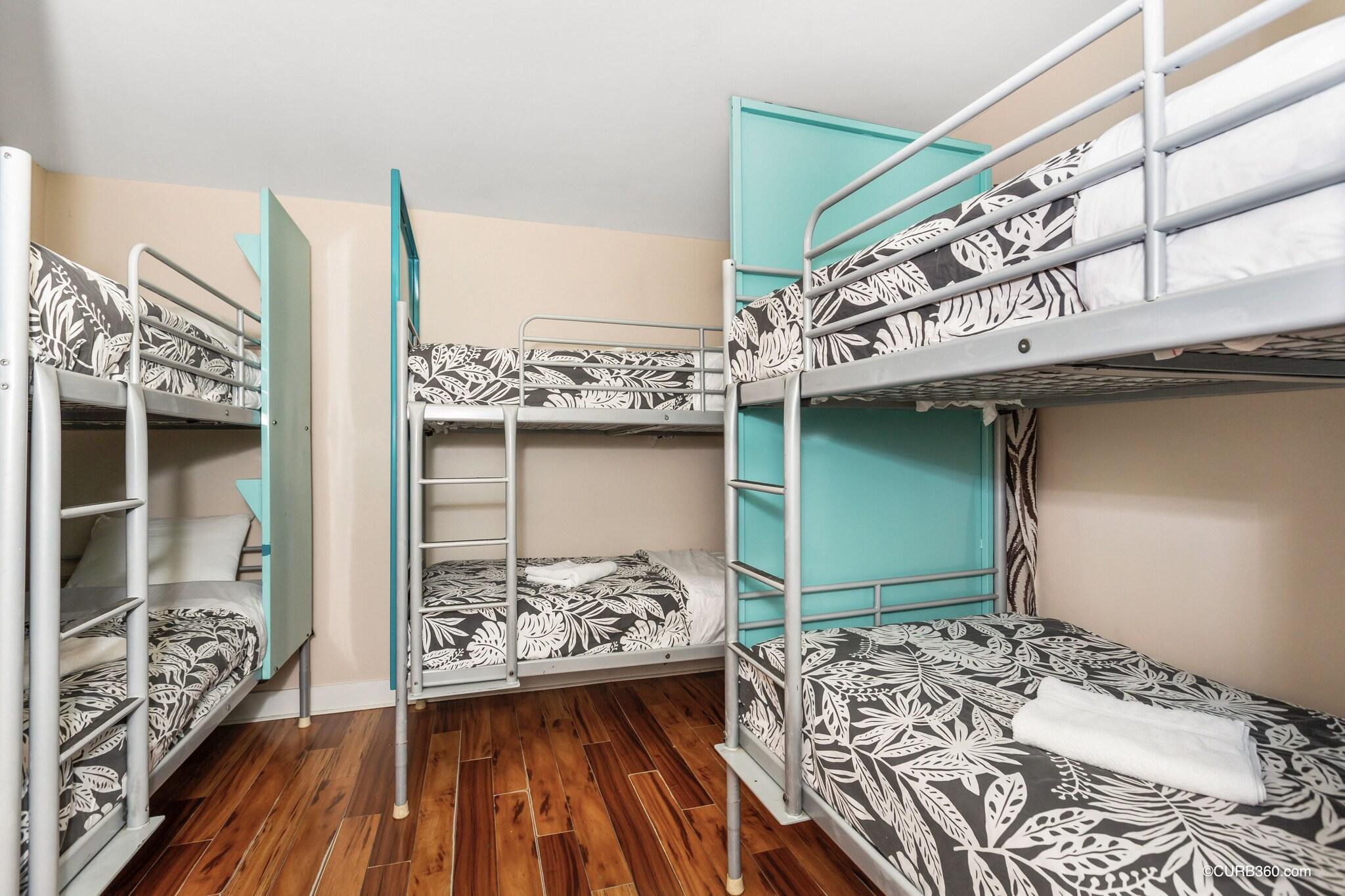 Bed in Dormitory with Shared Bathroom