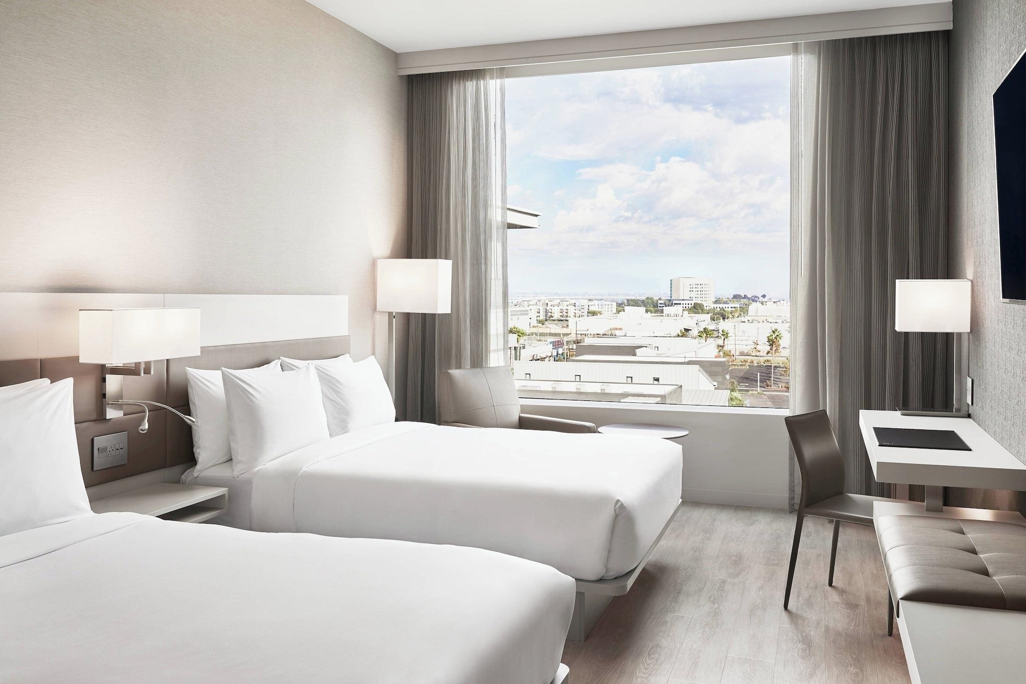 Quadruple City View Two Queen Beds