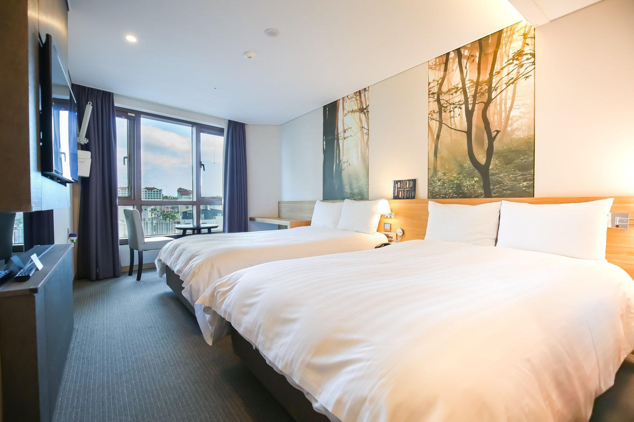 Double or Twin Deluxe Two Double Beds