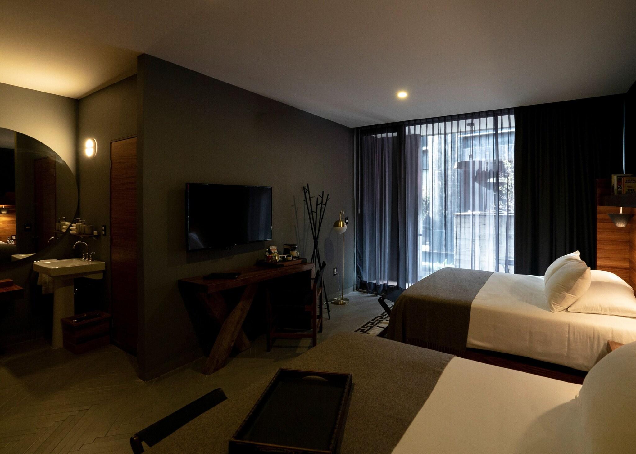 Double Deluxe Two Queen Beds