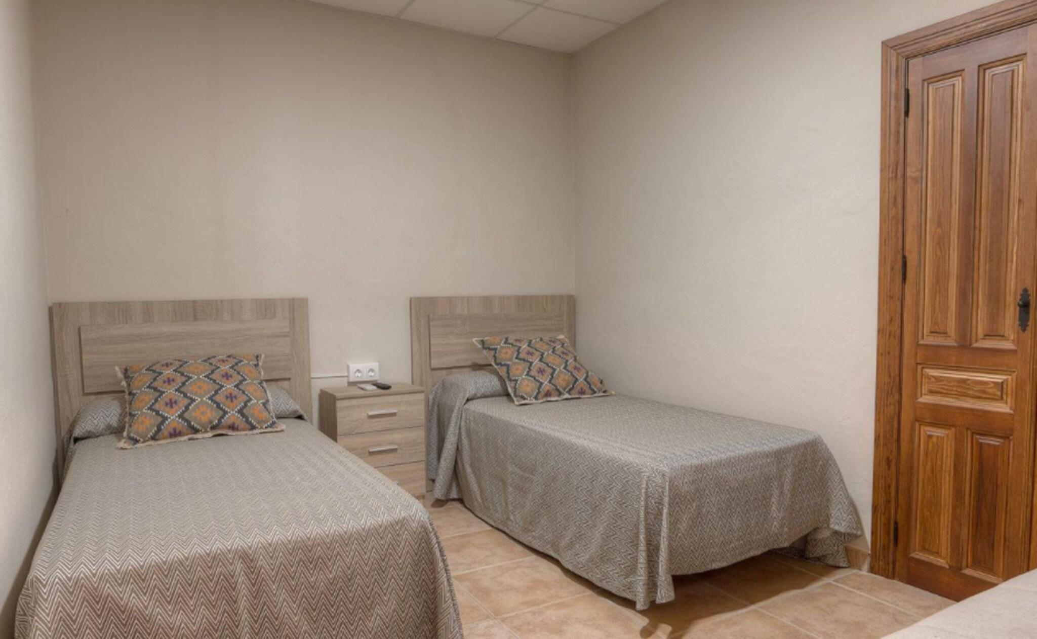 Triple Bunk Bed with Shared Bathroom