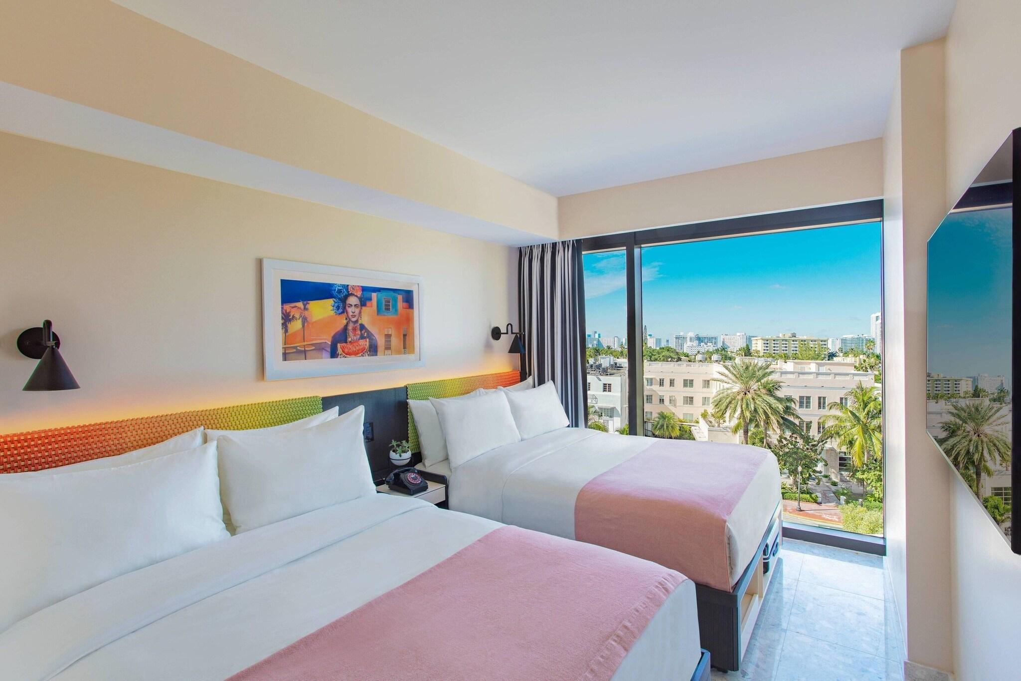 Quadruple Two Queen Beds