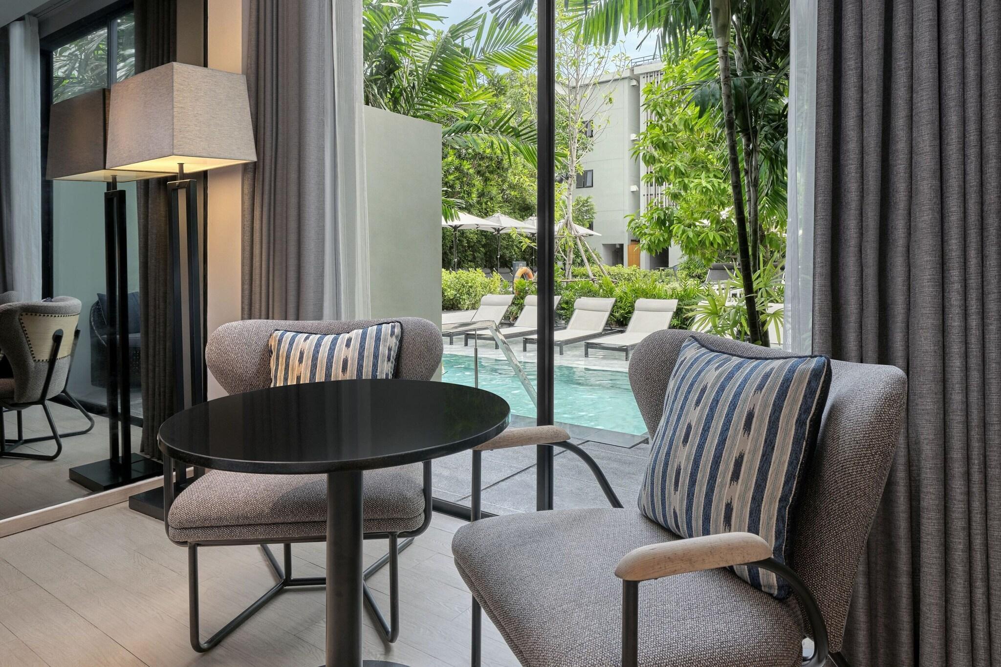 Twin Pool View Two Double Beds