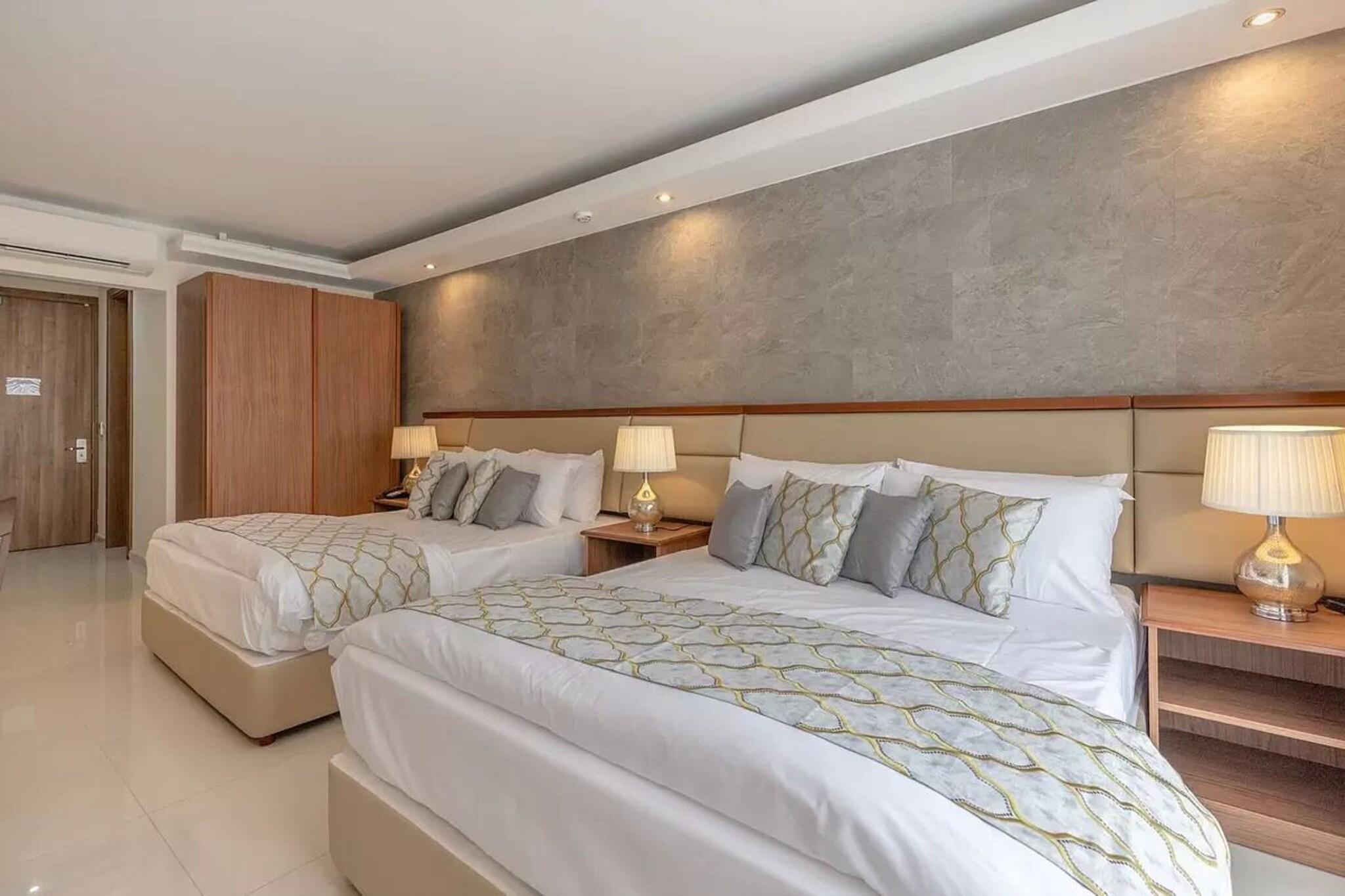 Quadruple Two King Beds