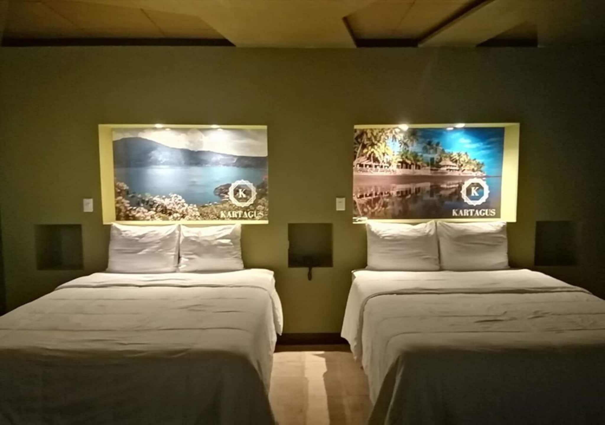 Quadruple Deluxe Two Queen Beds