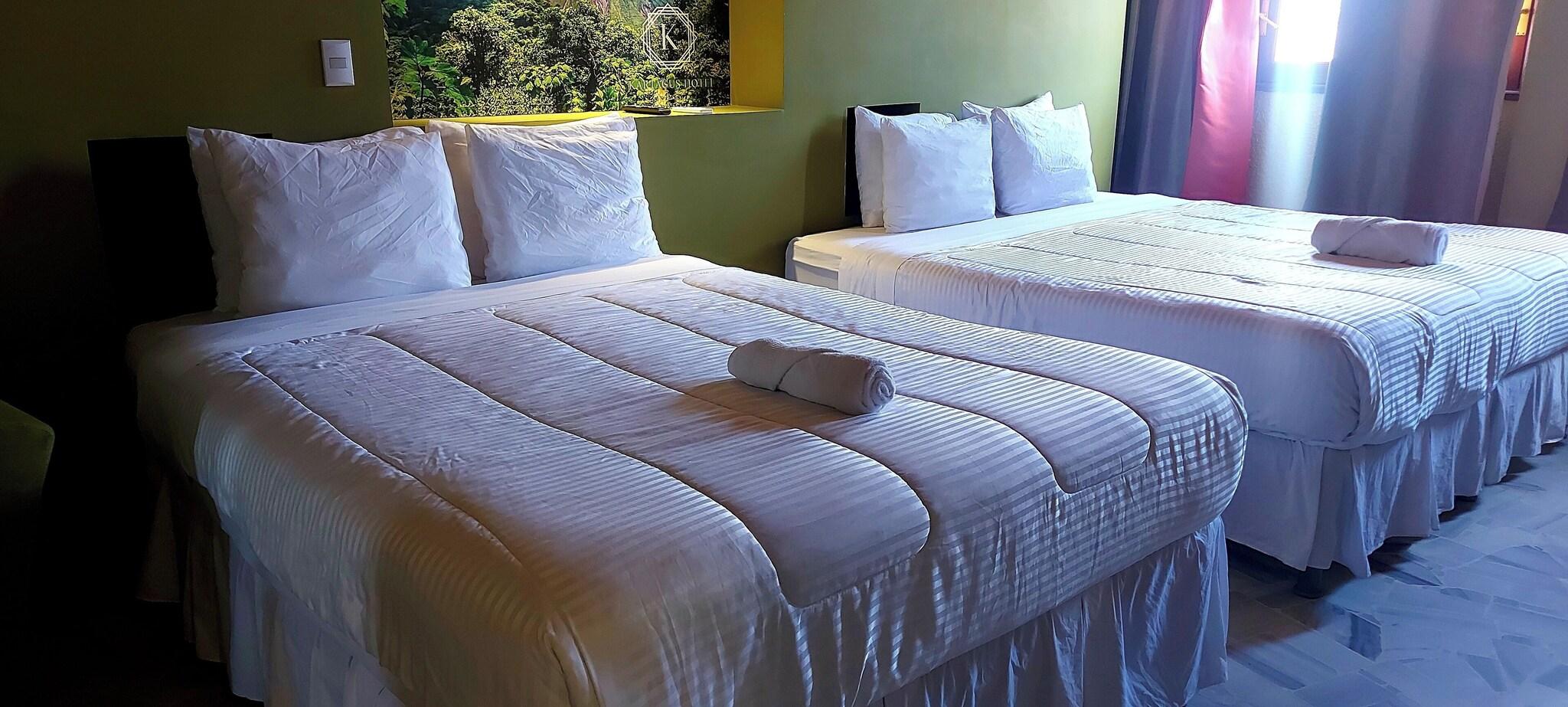 Quadruple Deluxe Two Queen Beds