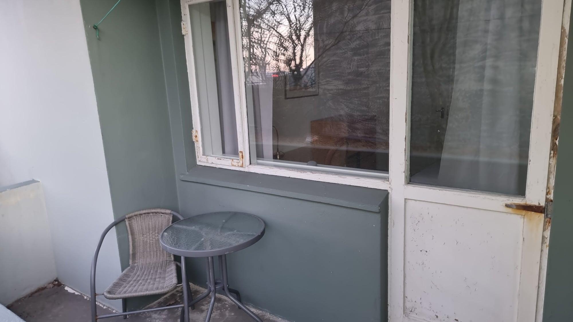 Single Economy with Shared Bathroom