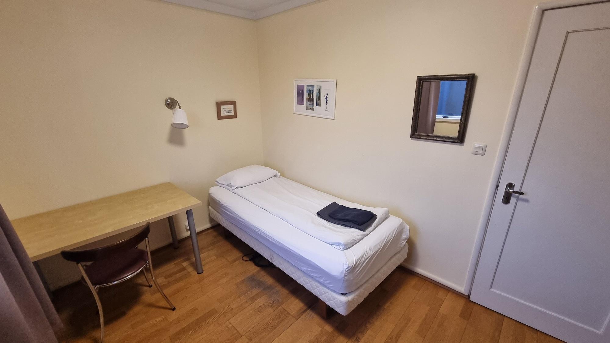 Single Economy with Shared Bathroom