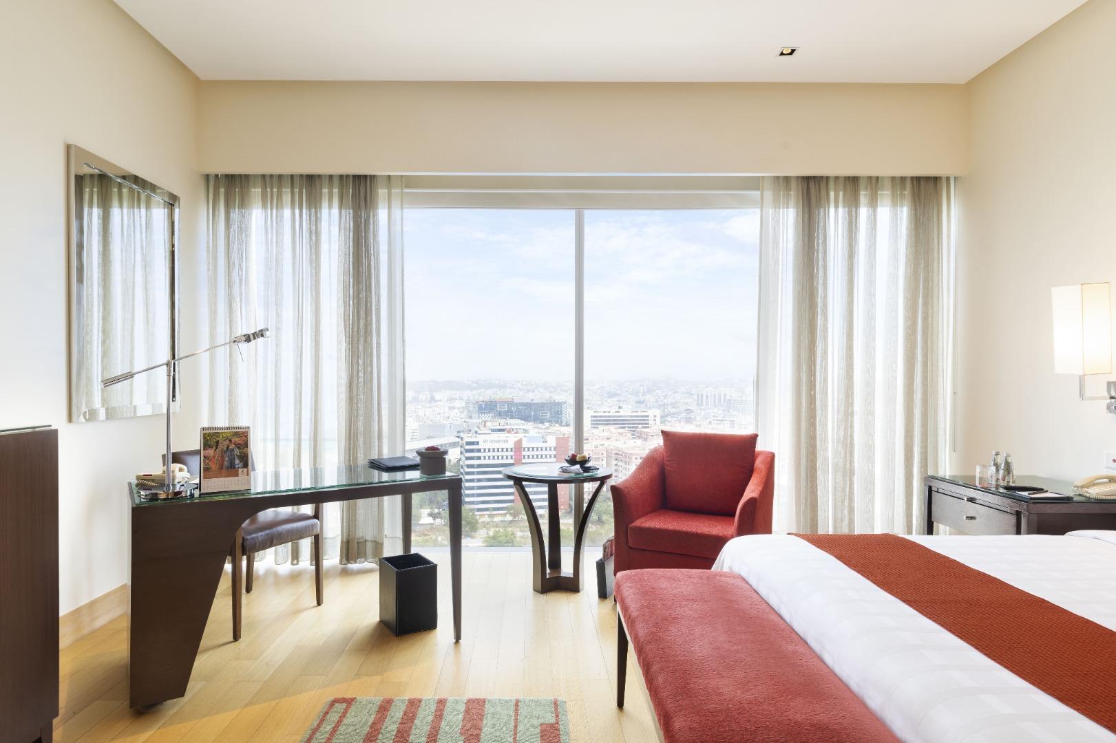 Double Deluxe City View King Bed