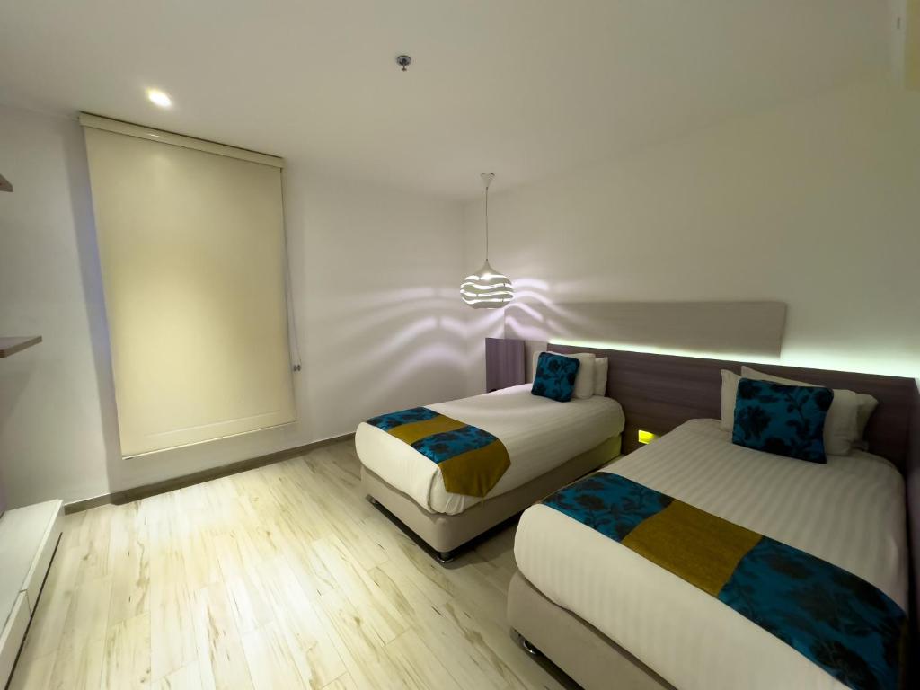 Twin Two Double Beds