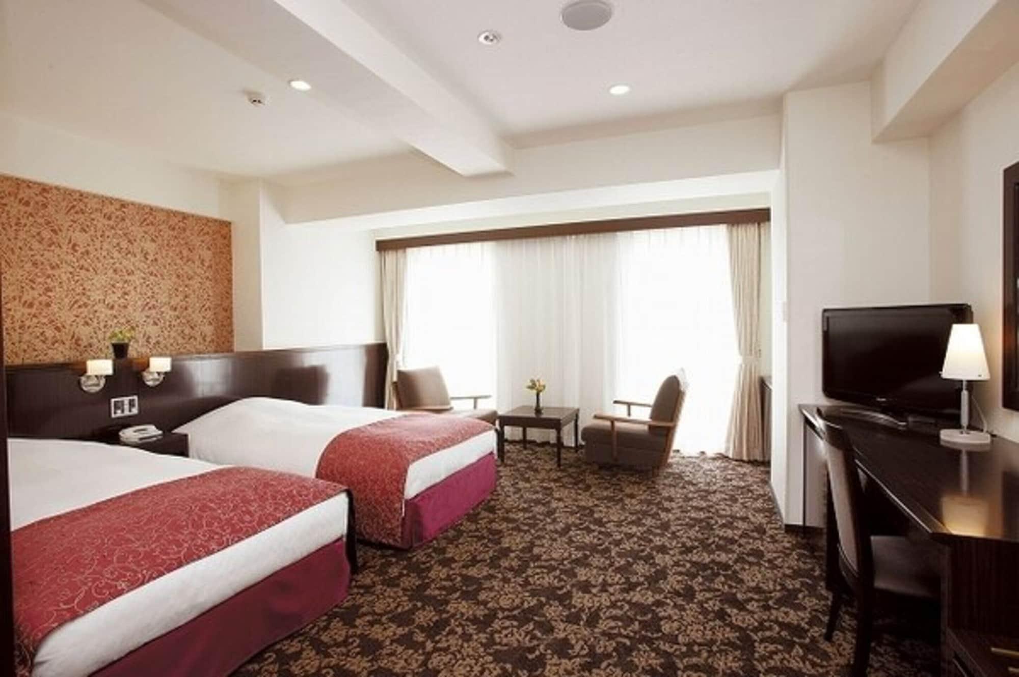 Twin Deluxe Two Beds