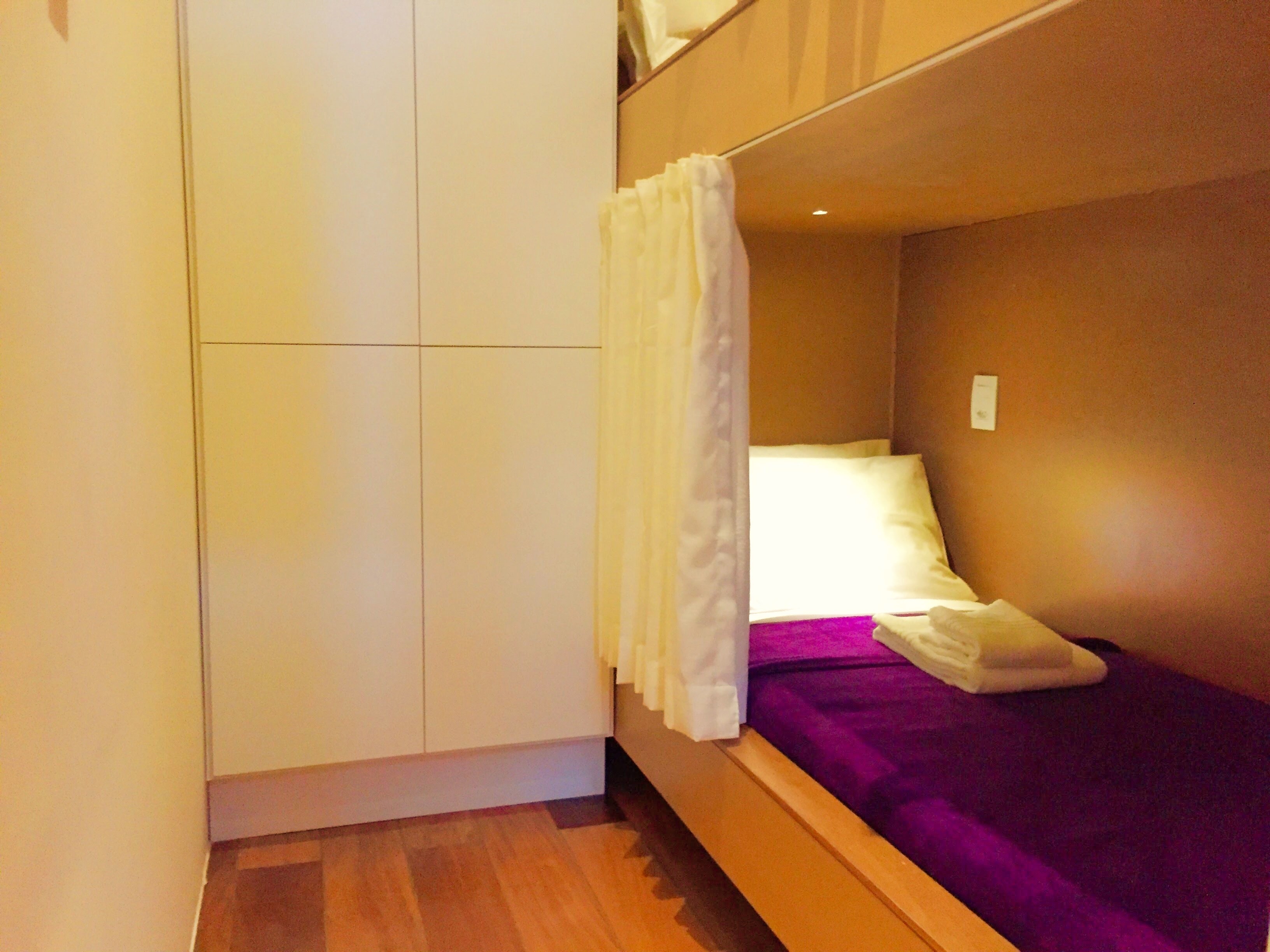 Bed in Dormitory with Shared Bathroom