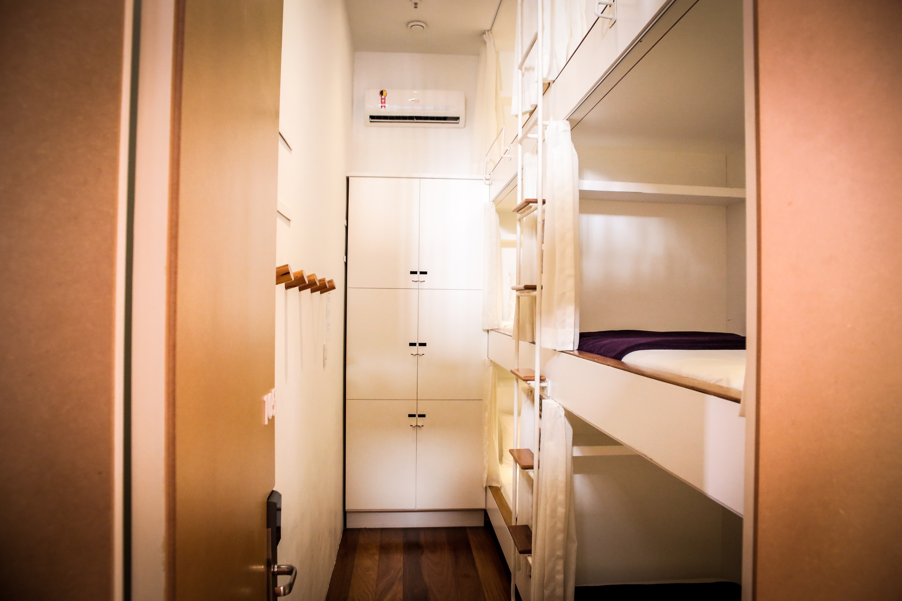 Bed in Dormitory with Shared Bathroom