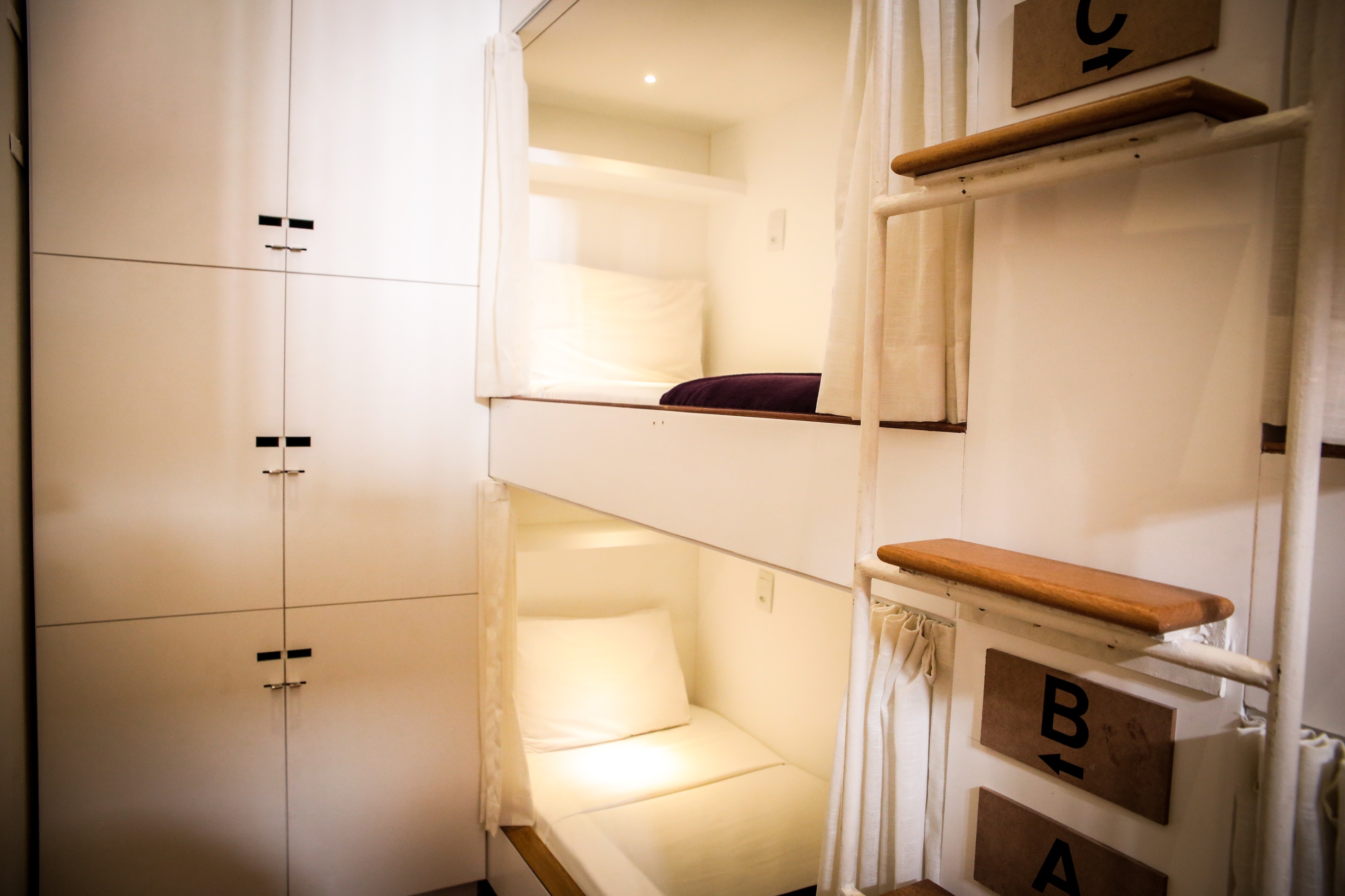 Bed in Dormitory with Shared Bathroom