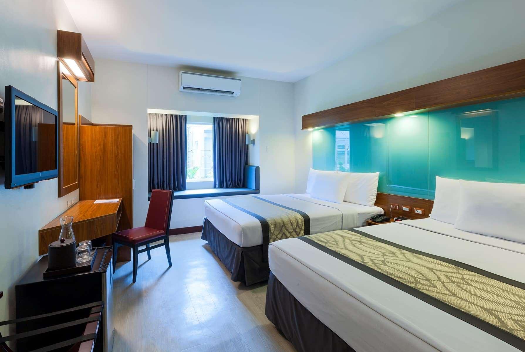 Quadruple Two Queen Beds