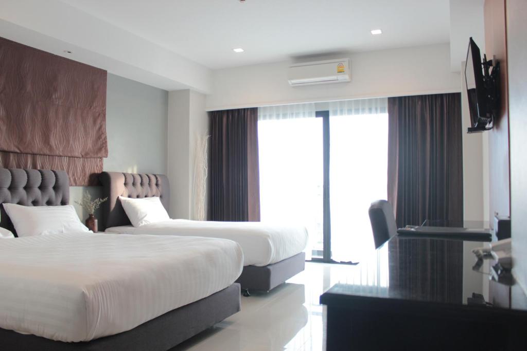 Triple Deluxe with Balcony