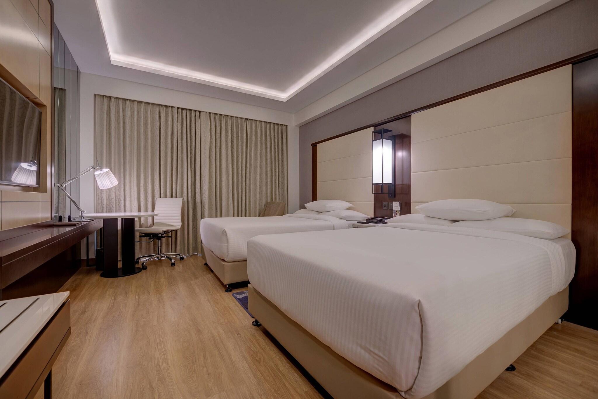 Quadruple Executive Two Queen Beds