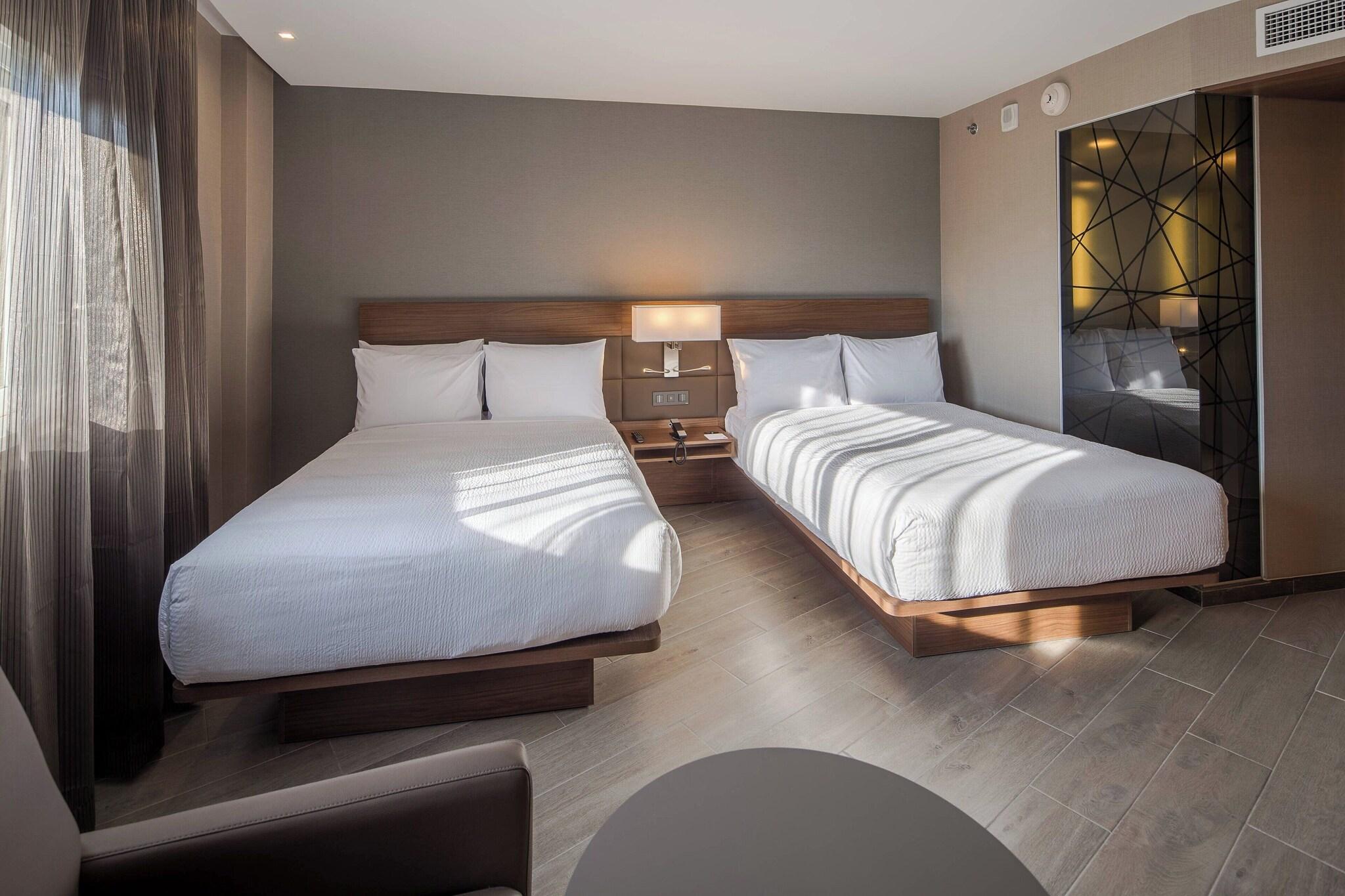 Quadruple City View Two Double Beds