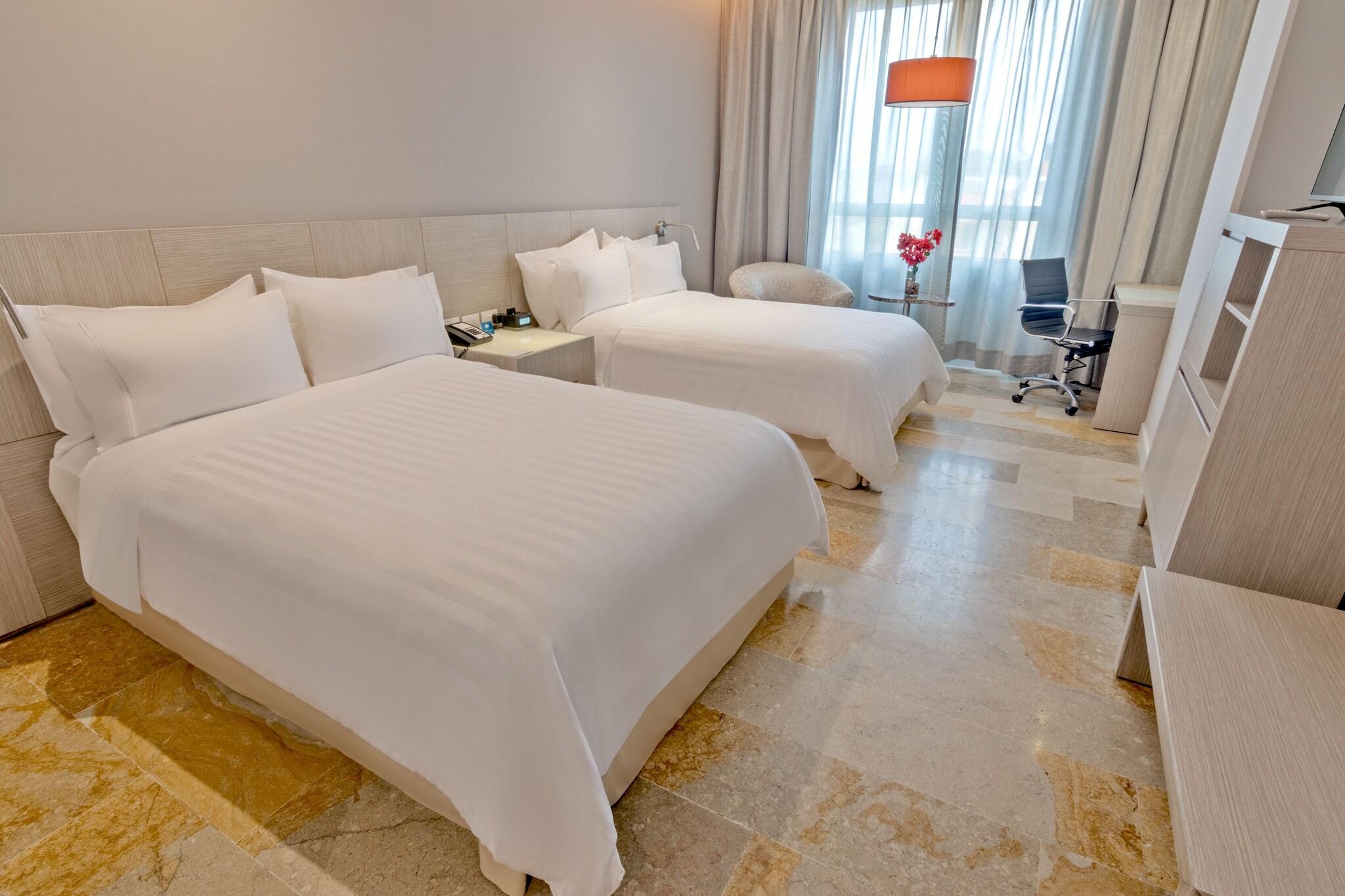 Single Superior Two Double Beds