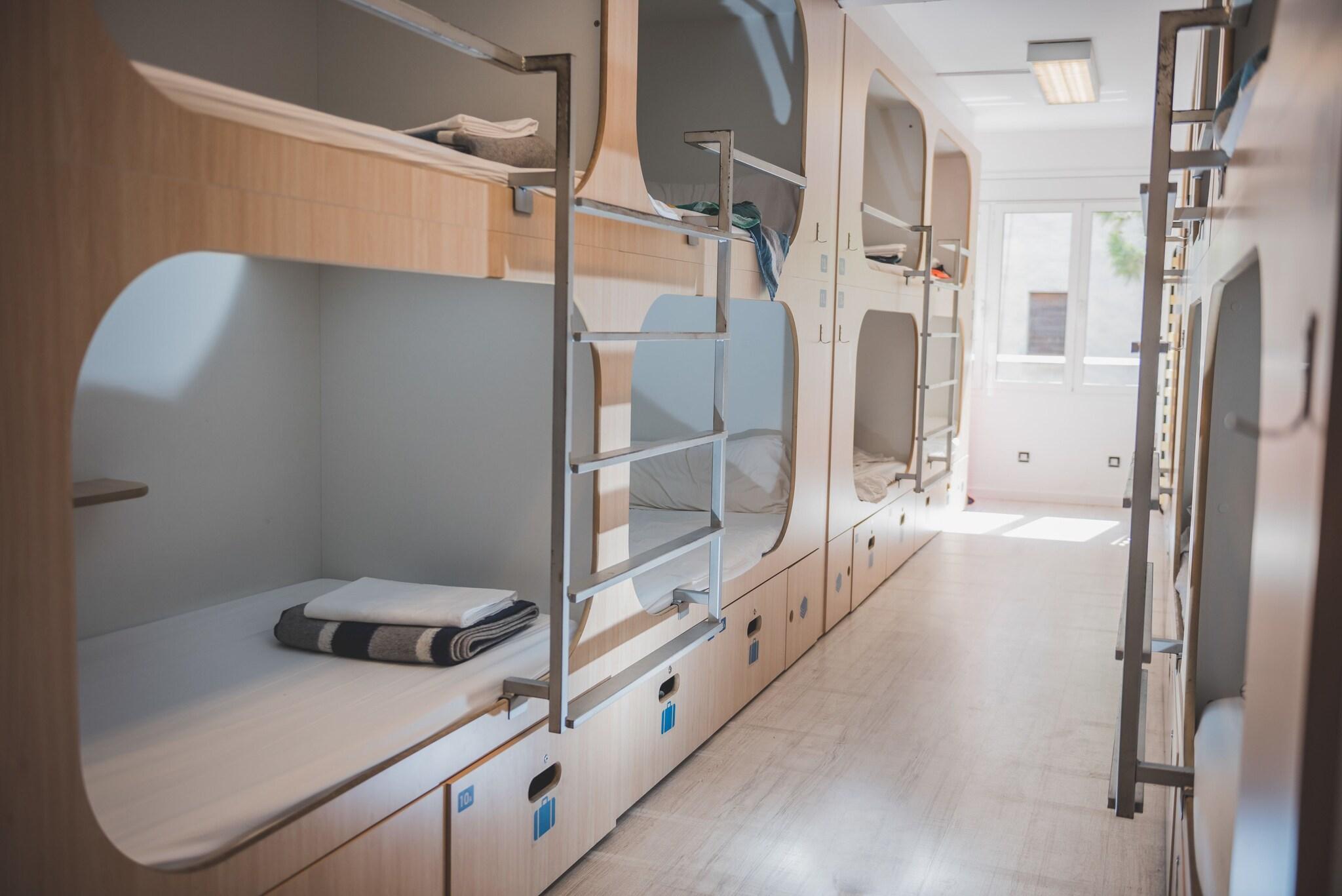 Bed in Dormitory with Shared Bathroom