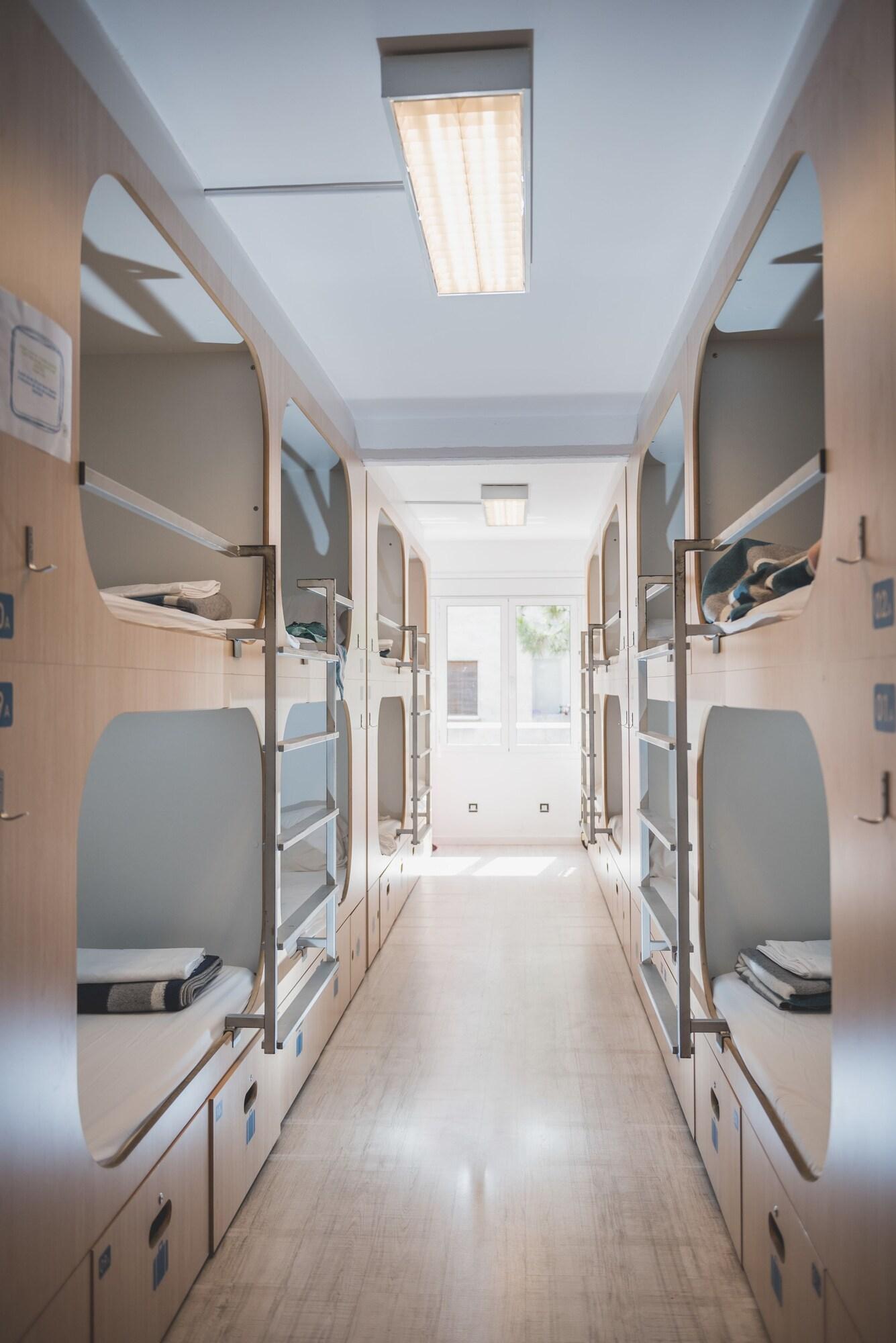 Bed in Dormitory with Shared Bathroom