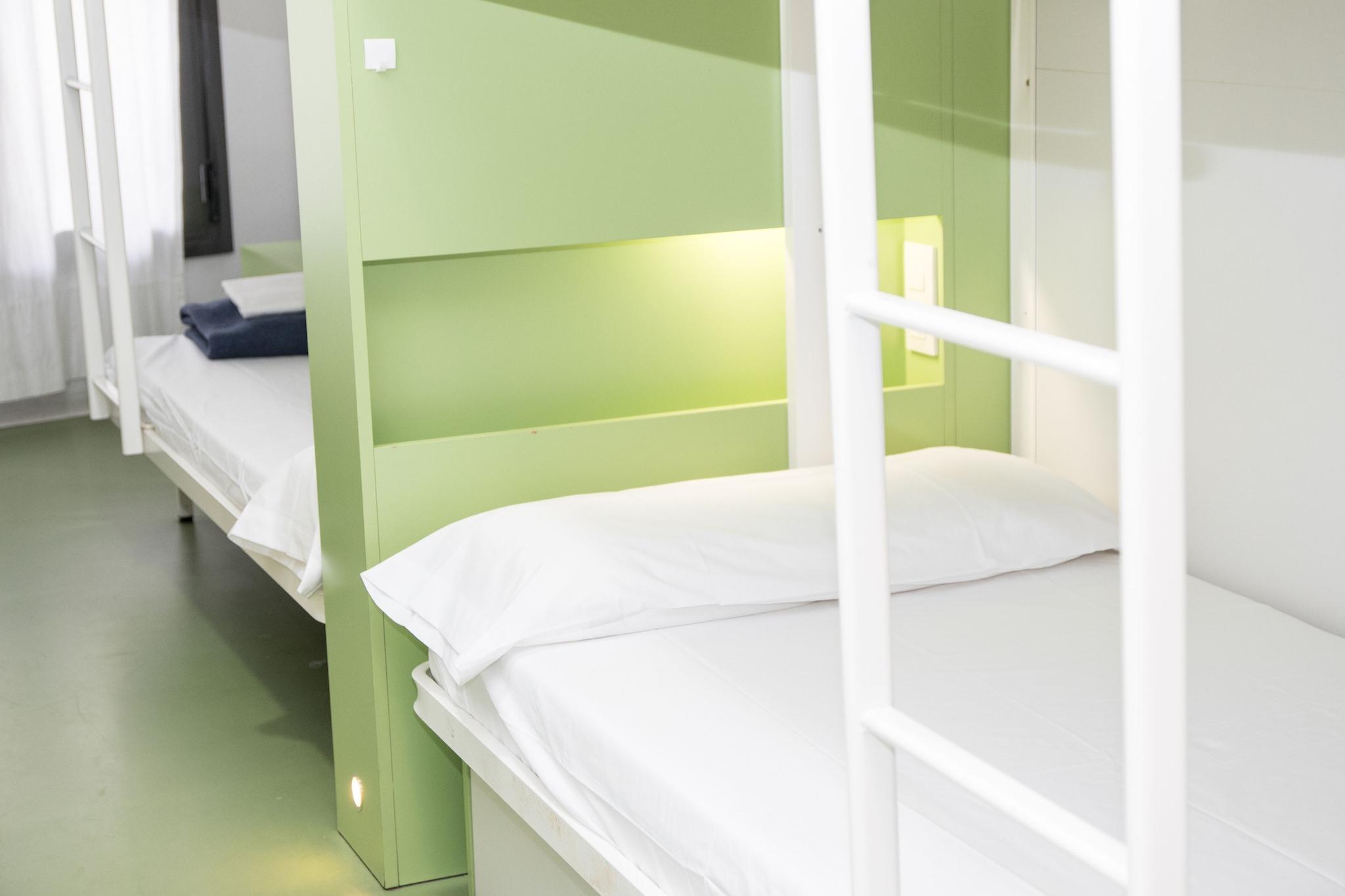 Bed in Dormitory Female Room with Shared Bathroom