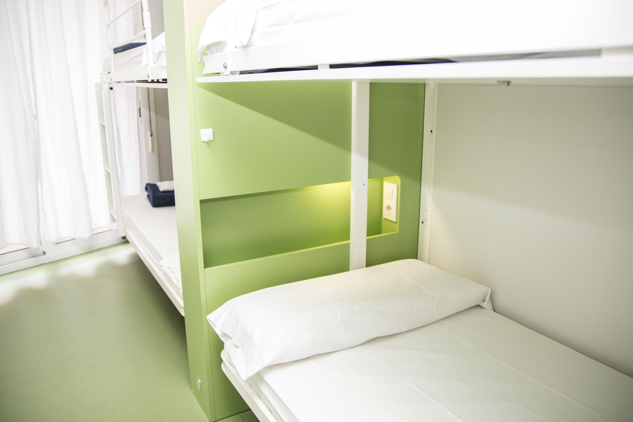 Bed in Dormitory Female Room