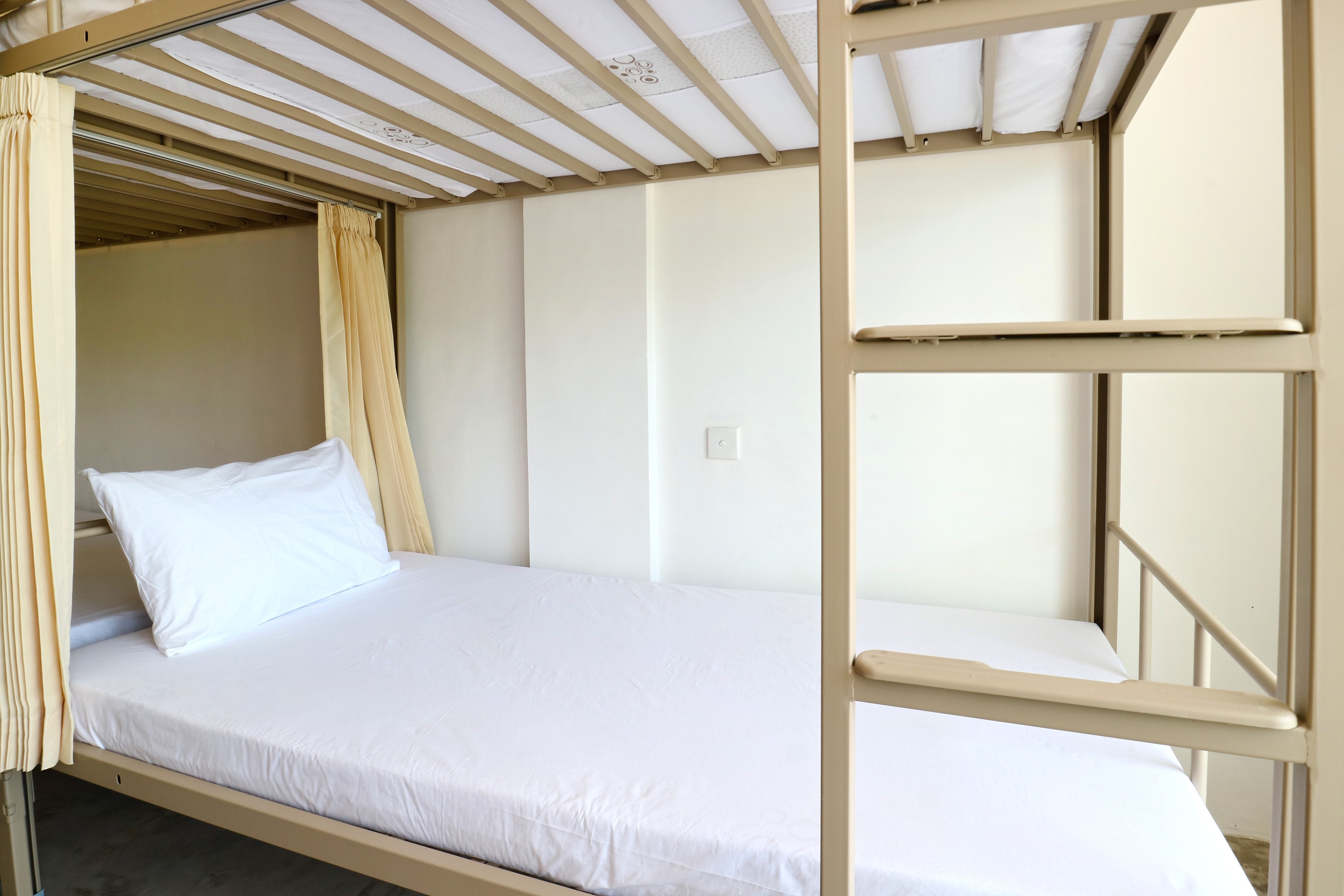 Bed in Dormitory Female Room