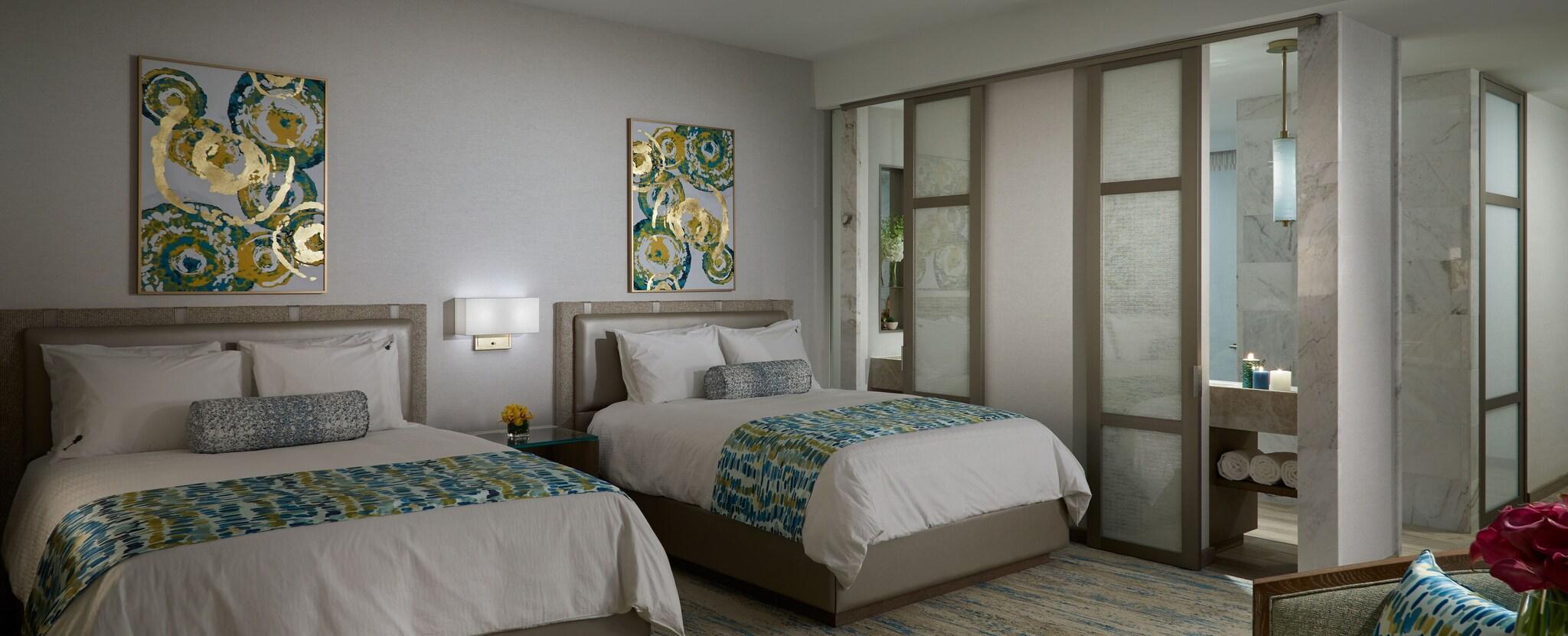 Quadruple Deluxe Two Queen Beds